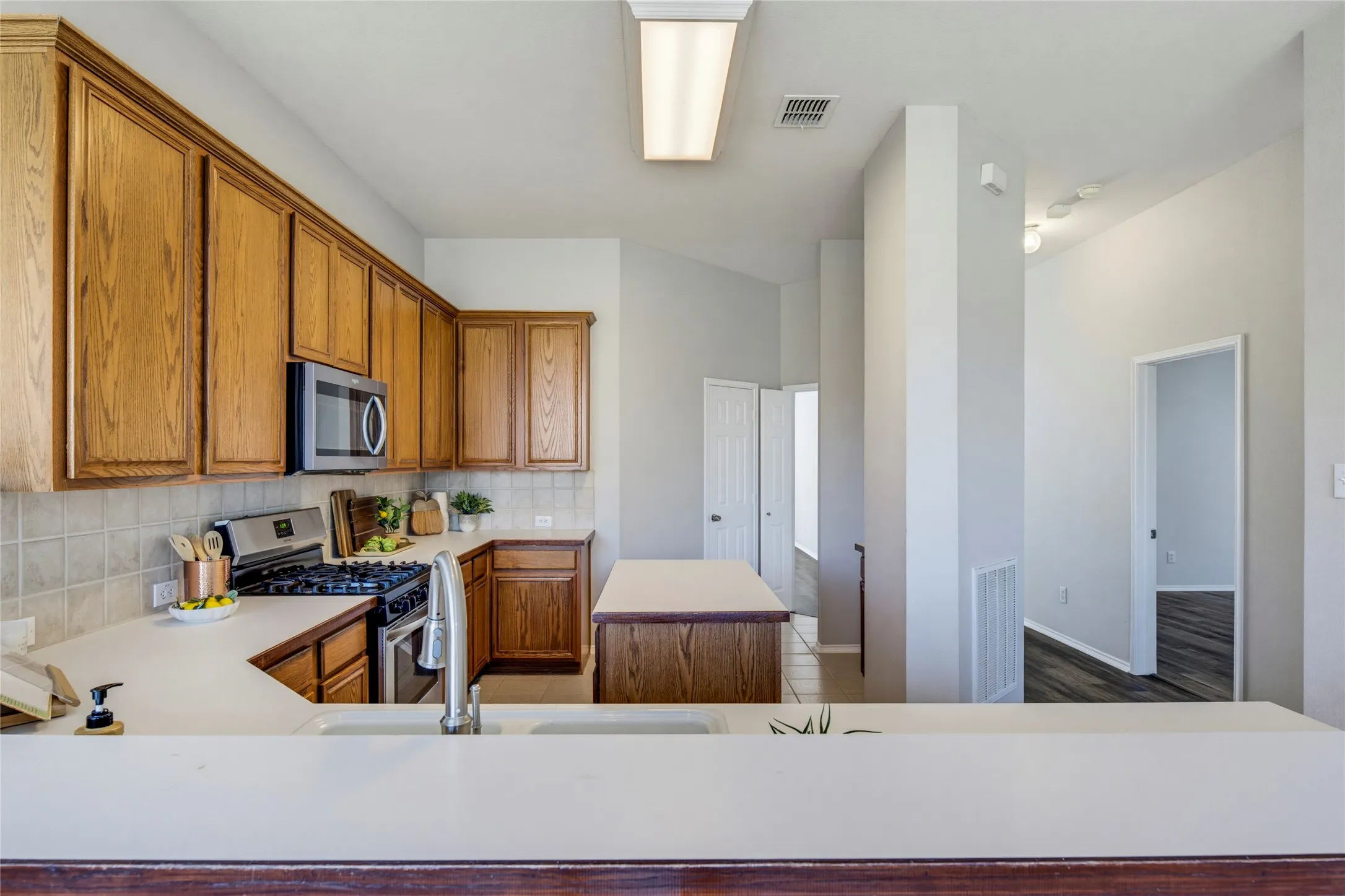 The breakfast bar creates more countertop space and also provides additional space to enjoy casual meals.