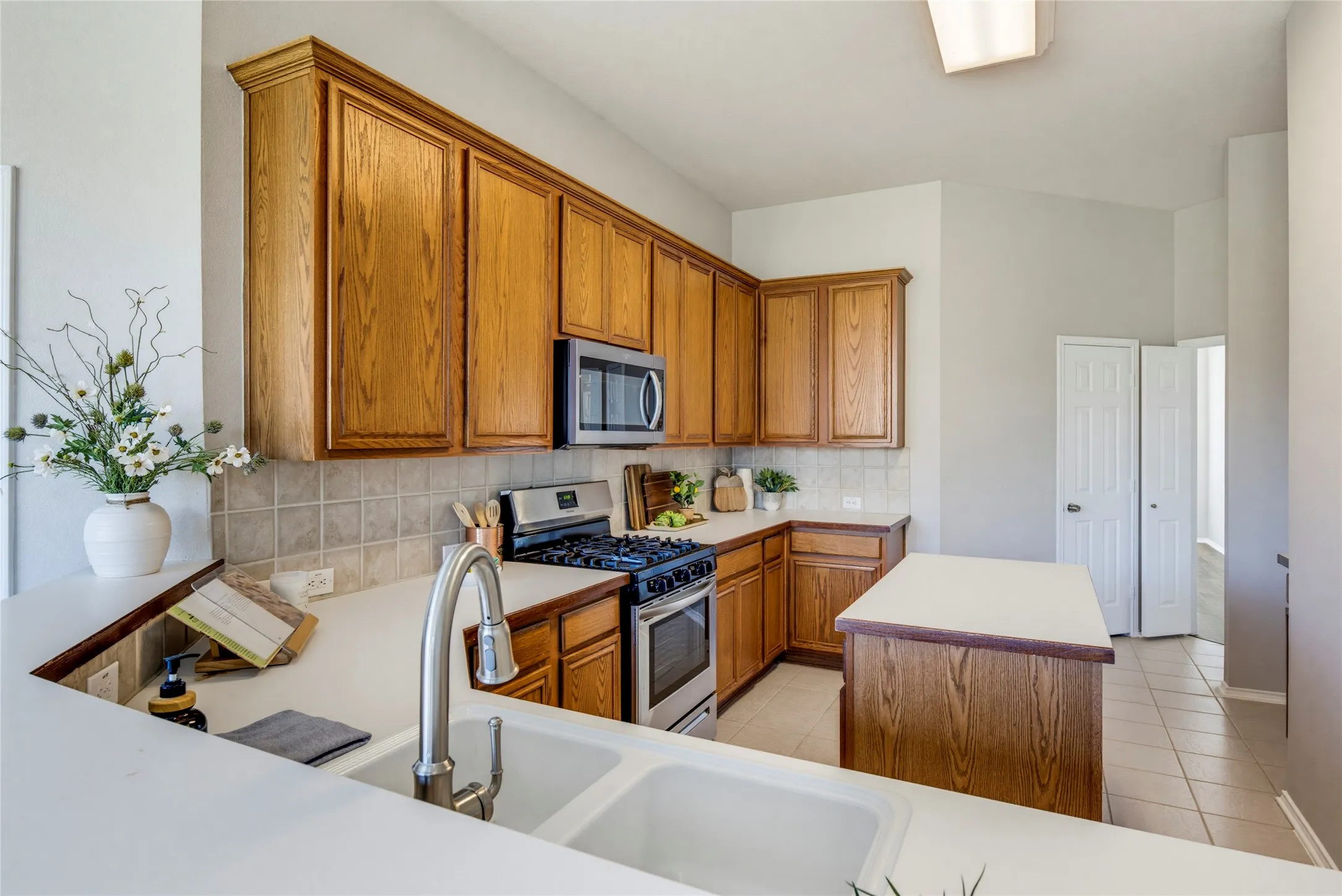 This view looks toward the entry flanked by the dining room and formal living room.