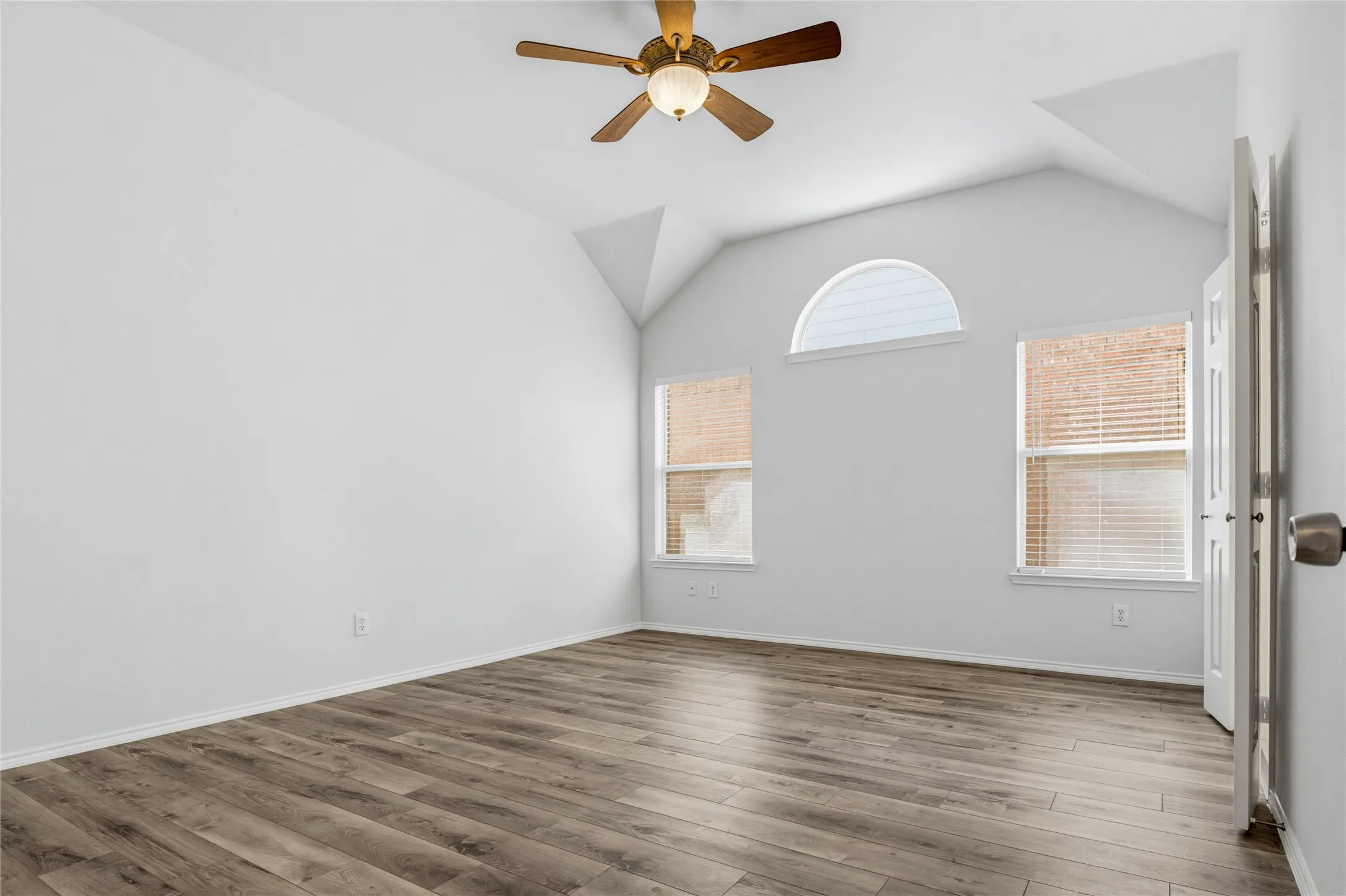 The primary bedroom is split from the other 3 bedrooms for privacy. LVP extends into all of the bedrooms.