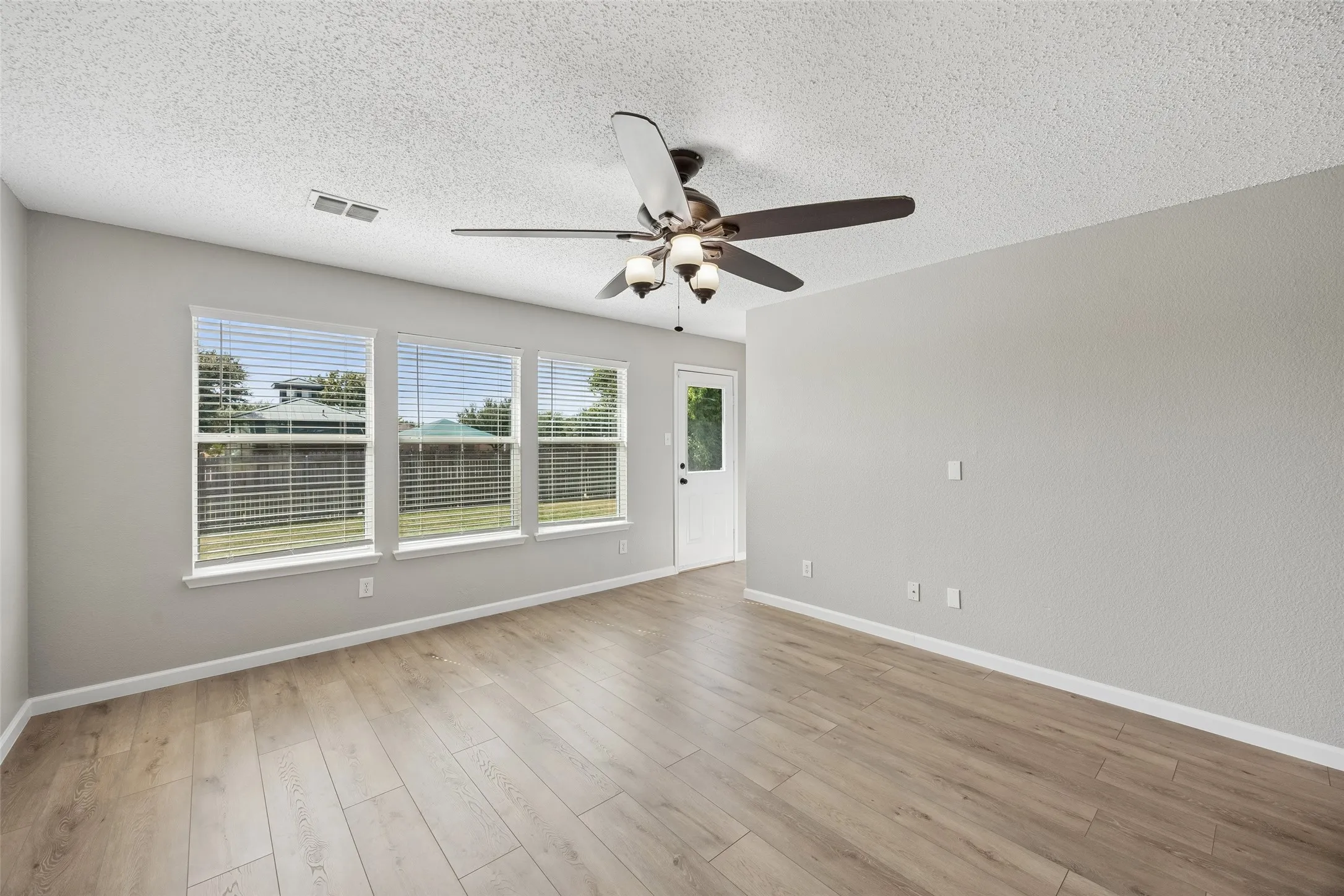 Large oversized living space with a open view to the back yard