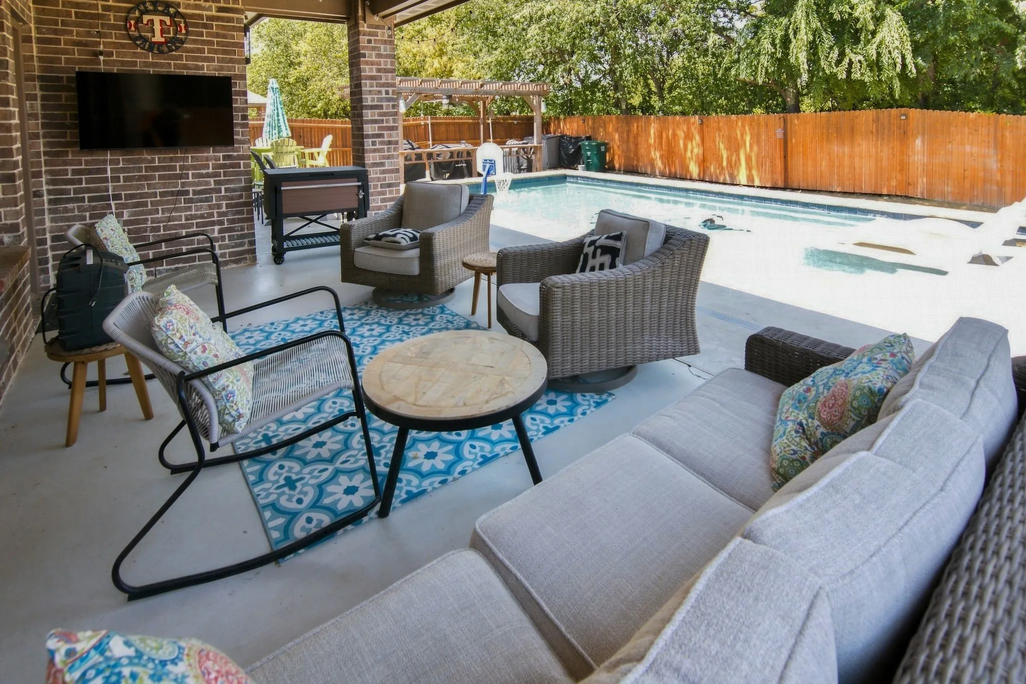 Large covered patio overlooking your pool and oasis backyard!