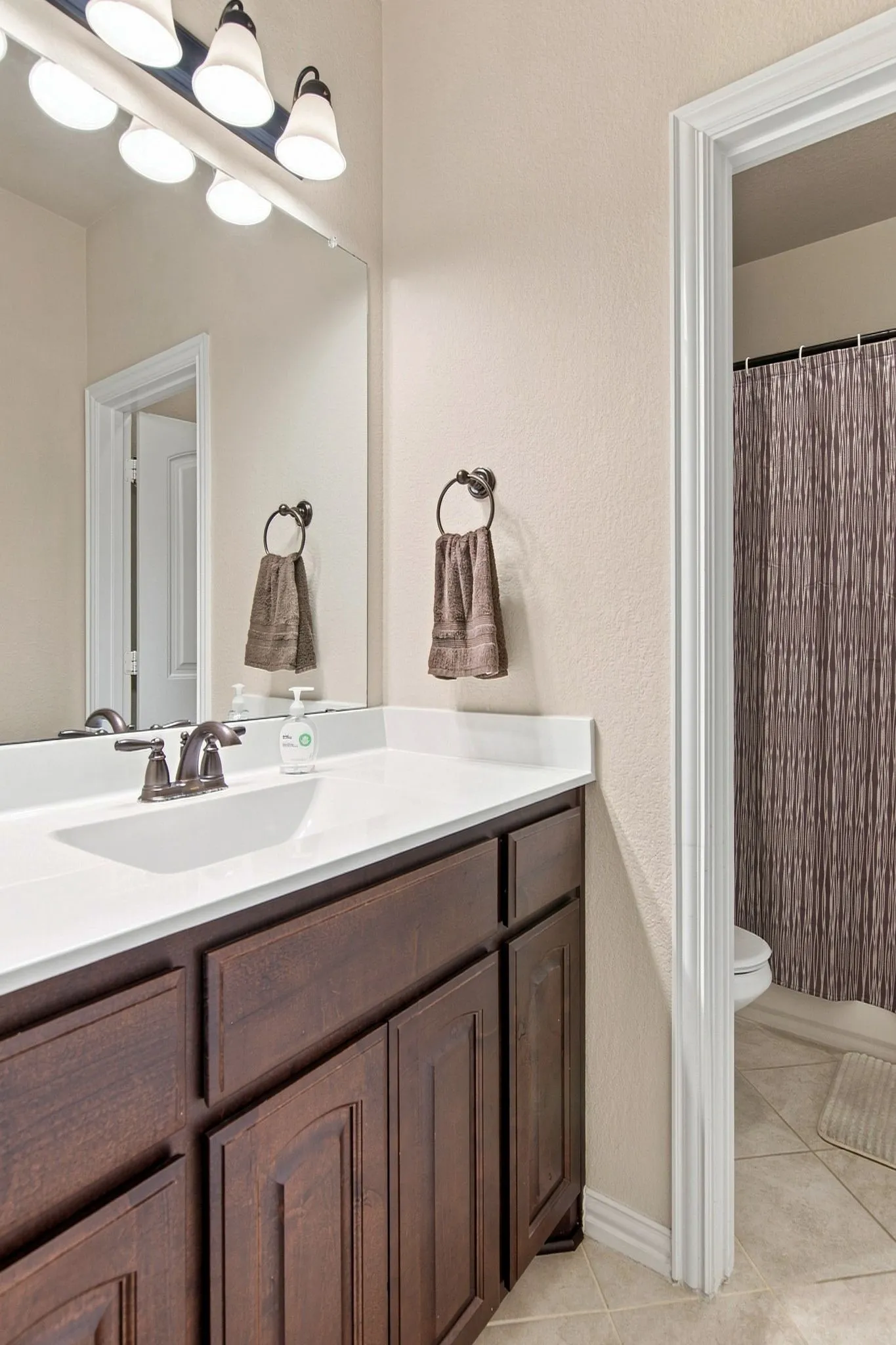 Upstairs full size bath with separate wet area from the vanity space
