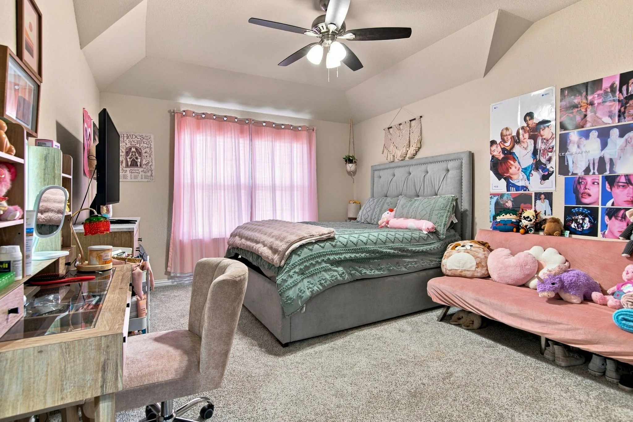 Upstairs second primary bedroom with ensuite bath and walk-in closet.