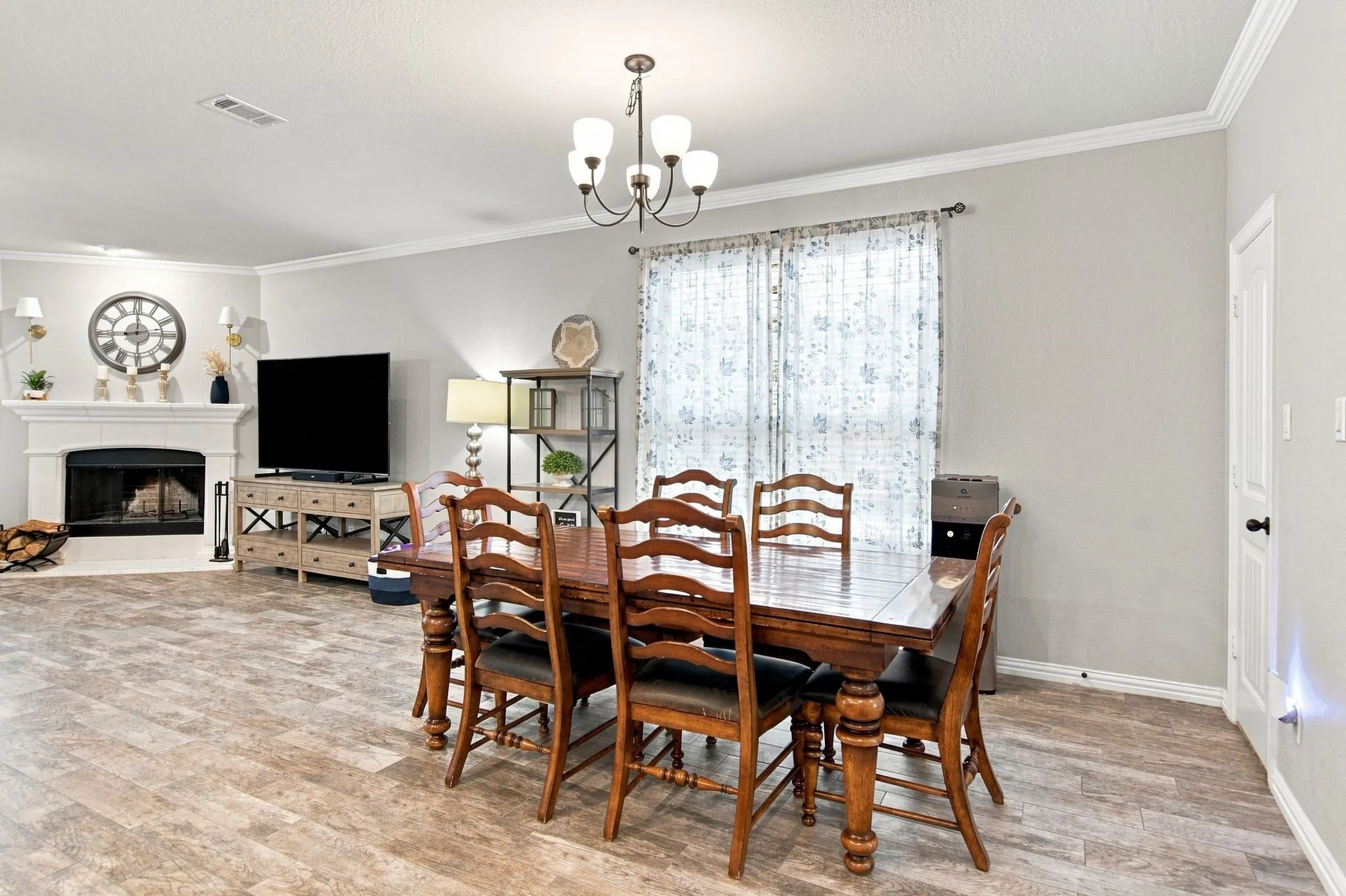 This dining space accommodates a large table and chairs.  (This dining set is for sale separately)