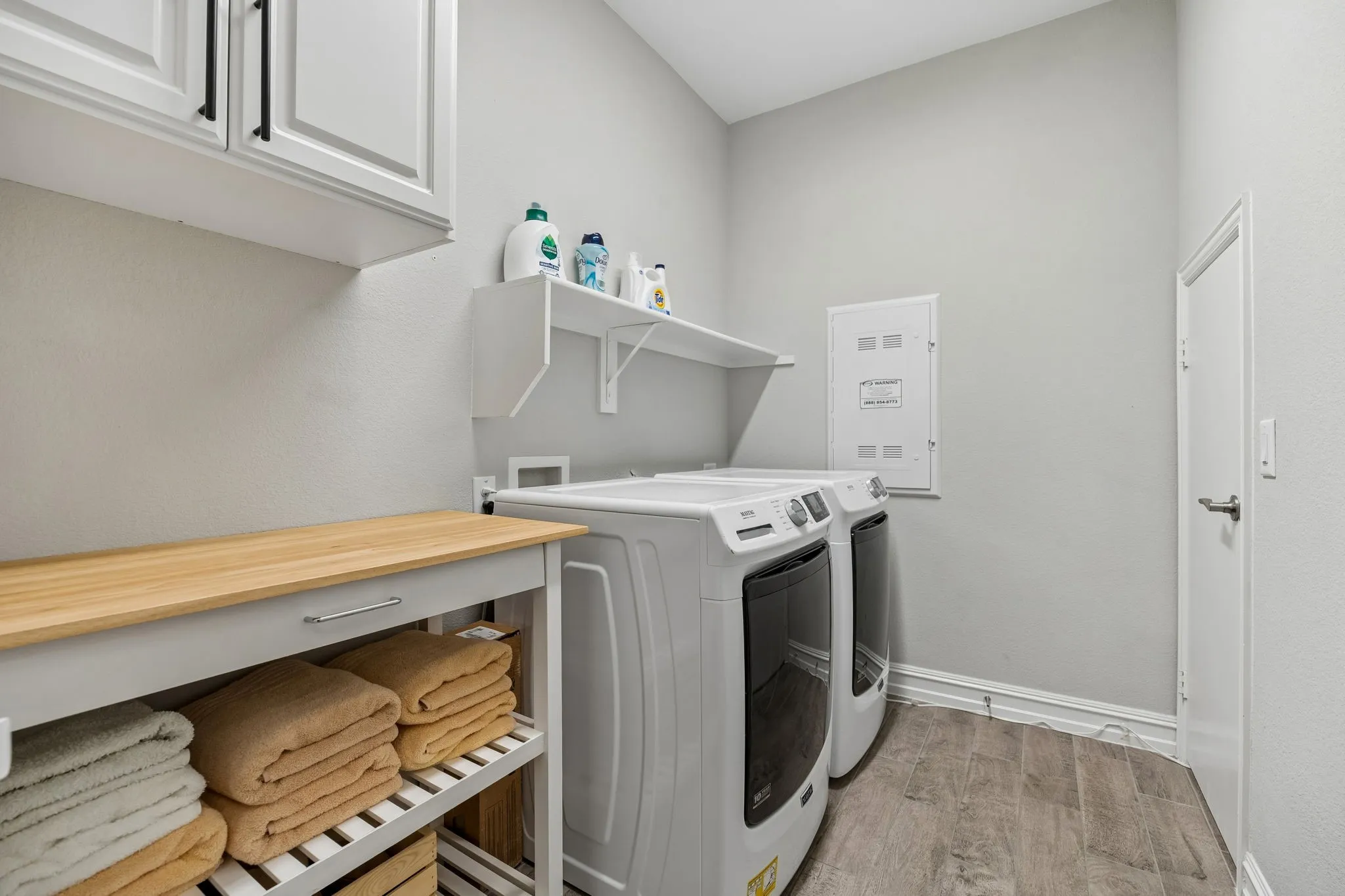 Great set up in the spacious laundry room and it has a walk in storage closet!