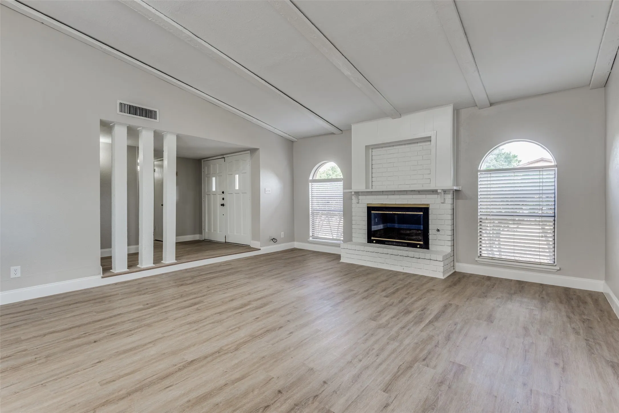 Living Area Including Brick Fireplace