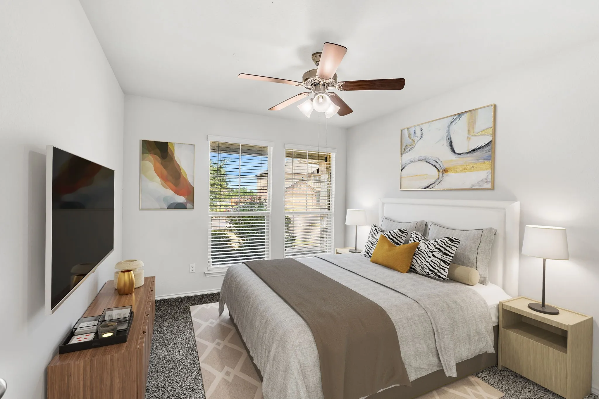 Virtually Staged Ceiling fan with light fixture, two windows with blinds, white walls, and gray carpeting