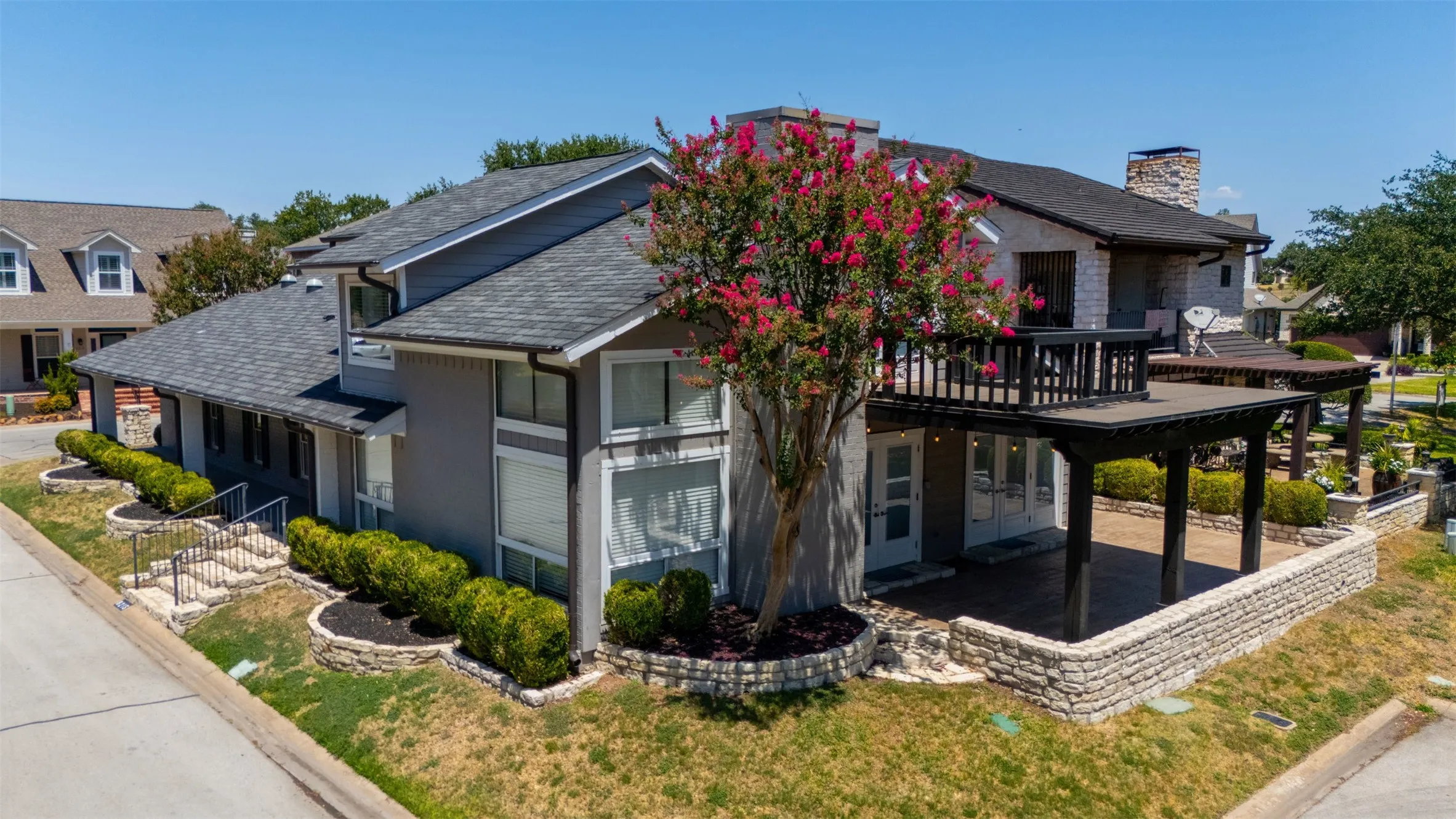 Covered patio and open balcony. Views to water and park.