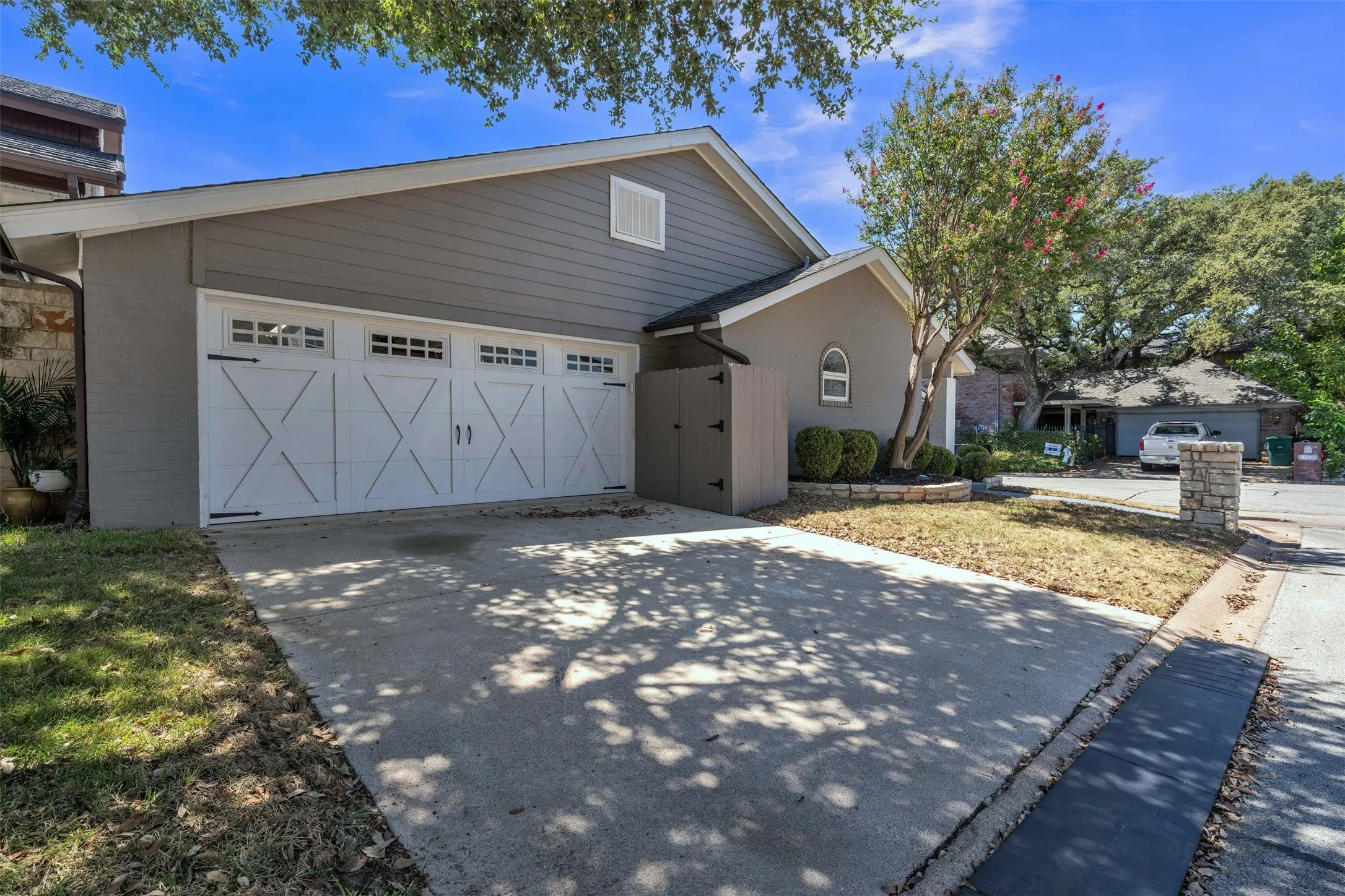 Corner Lot and oversized garage. Zero lot line home.