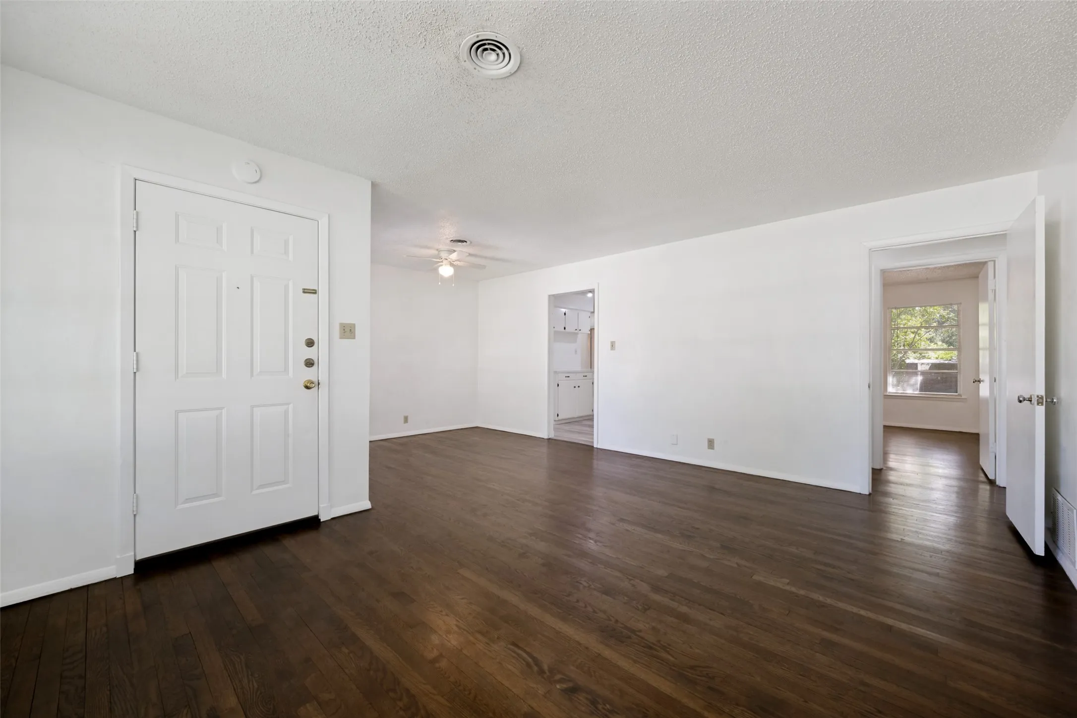 Main Living Area with hard wood floor.