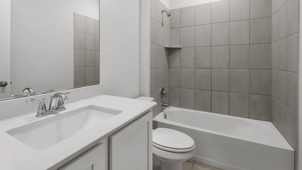 Vanity with integrated sink, chrome faucet, and quartz countertop