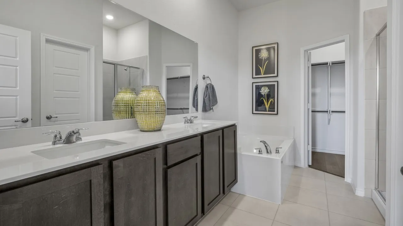 Double vanity with undermount sinks and chrome fixtures