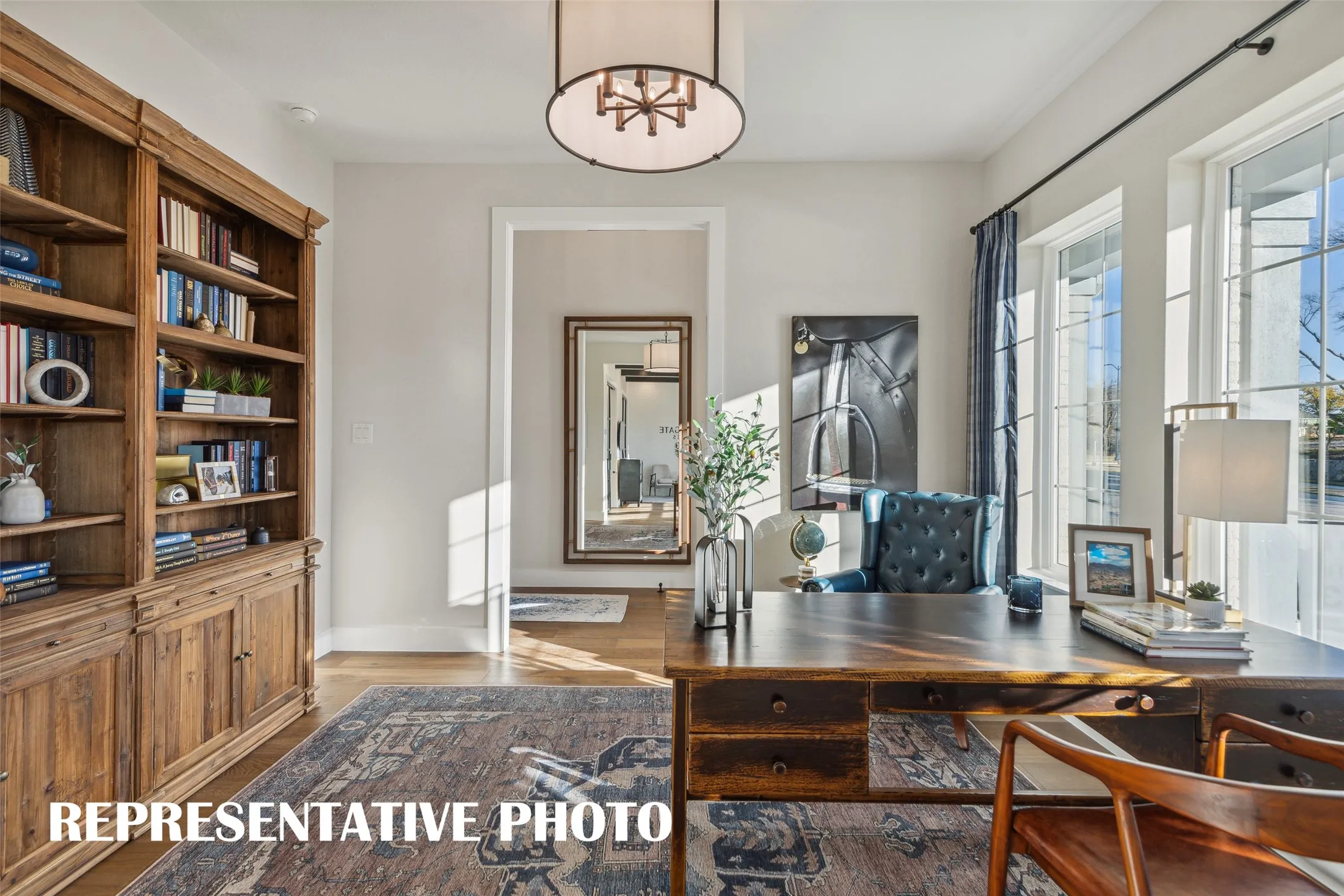 Your new dream home offers a light filled home office that is the perfect place for work or play!  REPRESENTATIVE PHOTO
