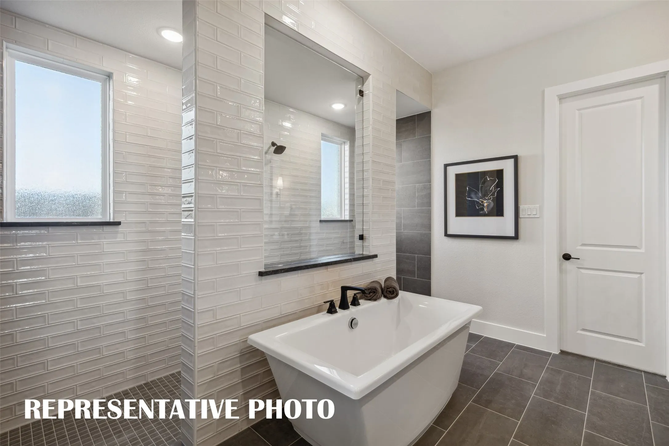 The Madison II floor plan features our signature owner's bath with freestanding tub, double walk through shower and drying areas!  REPRESENTATIVE PHOTO