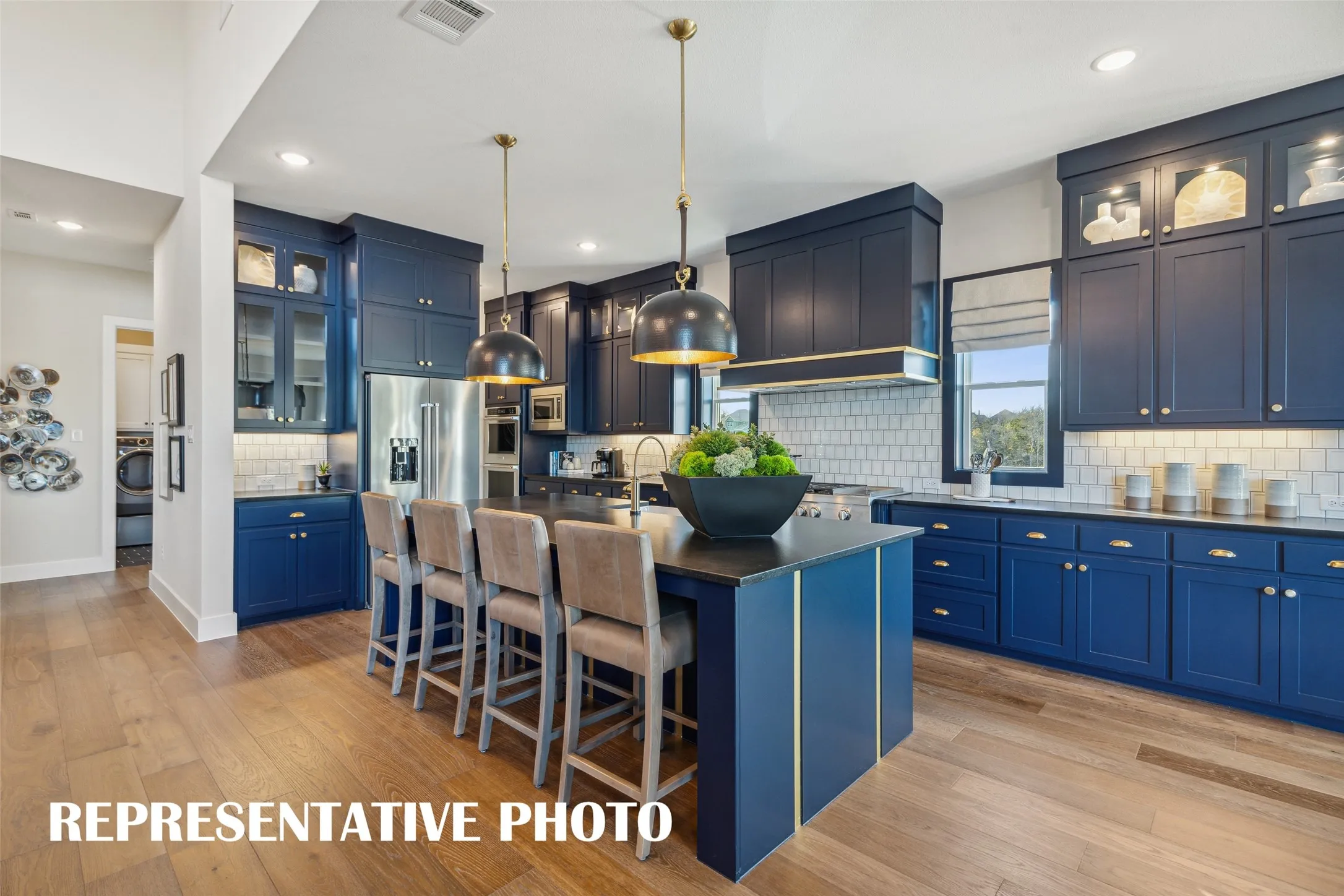 Our over the top Madison II plan offers a dream kitchen with tons of space and style!  REPRESENTATIVE PHOTO
