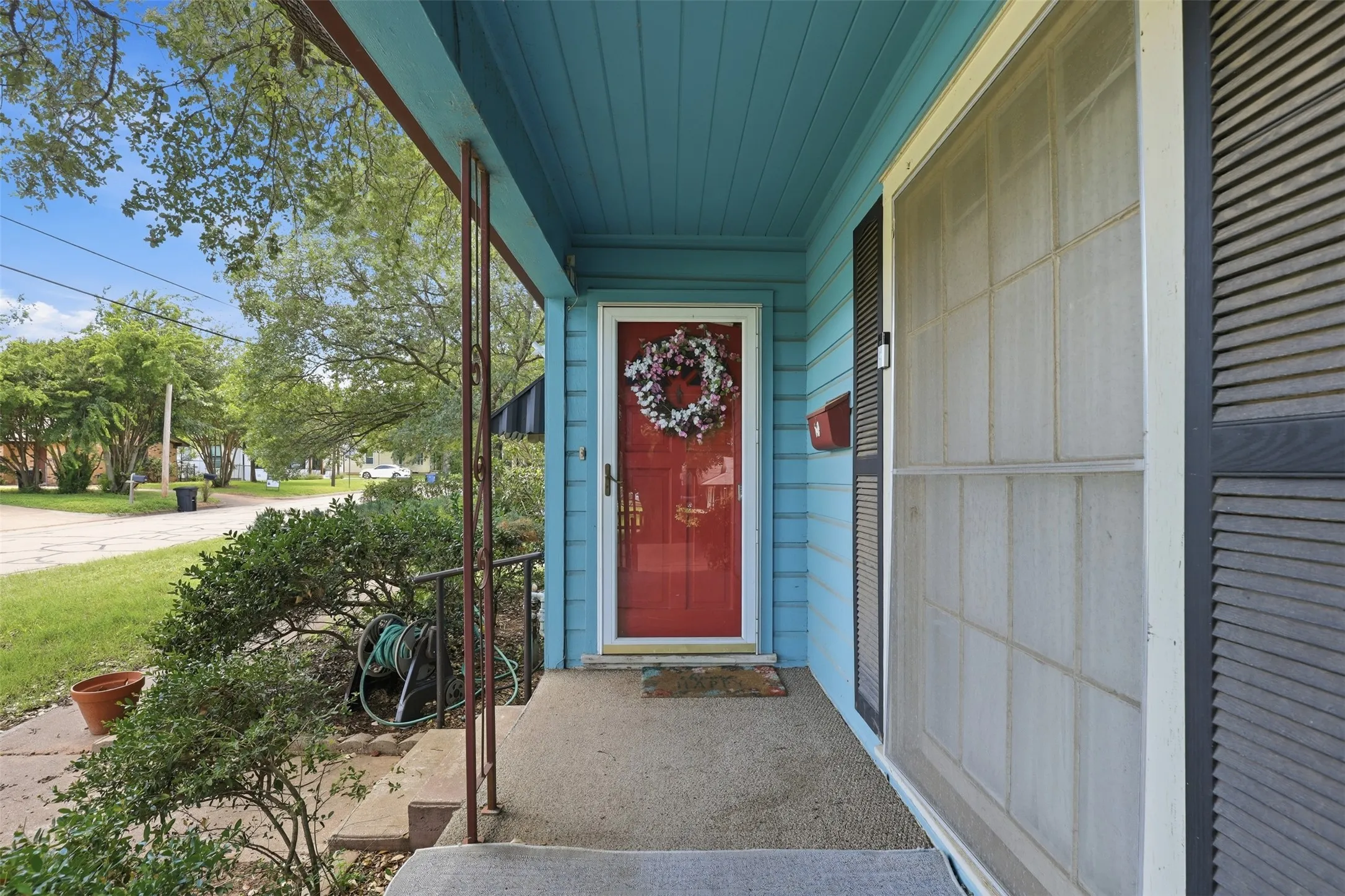 Isn't this a super cute front porch?