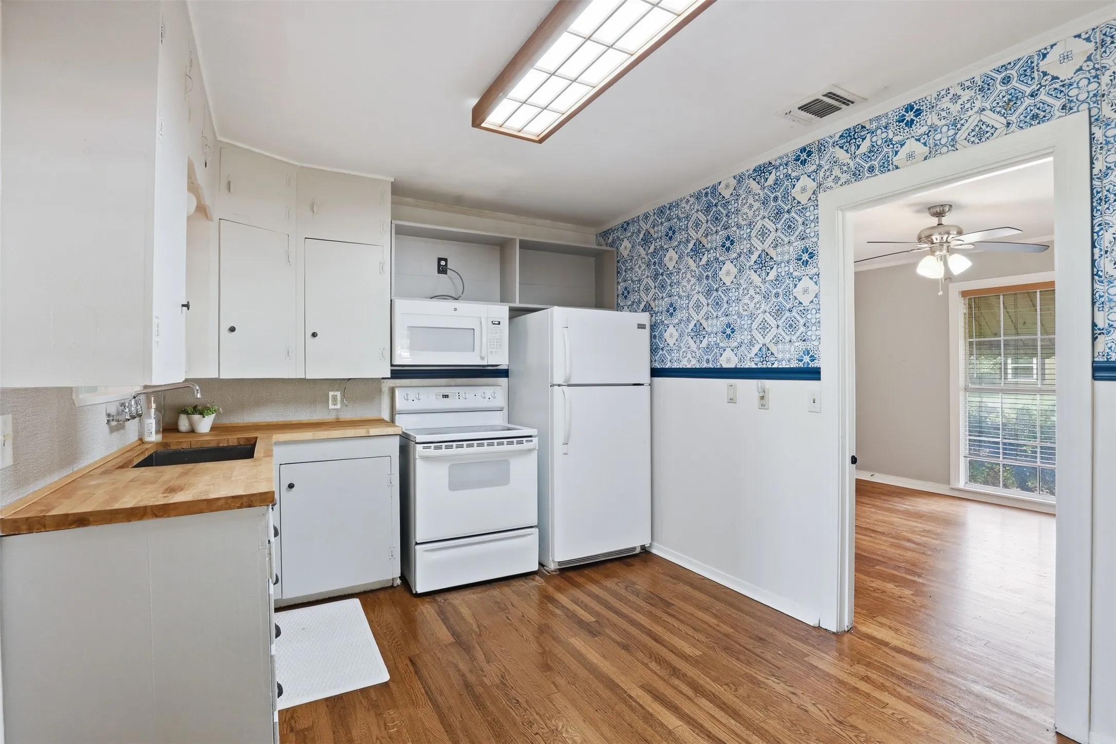The kitchen is open to the living room, and there's plenty of room for your table.