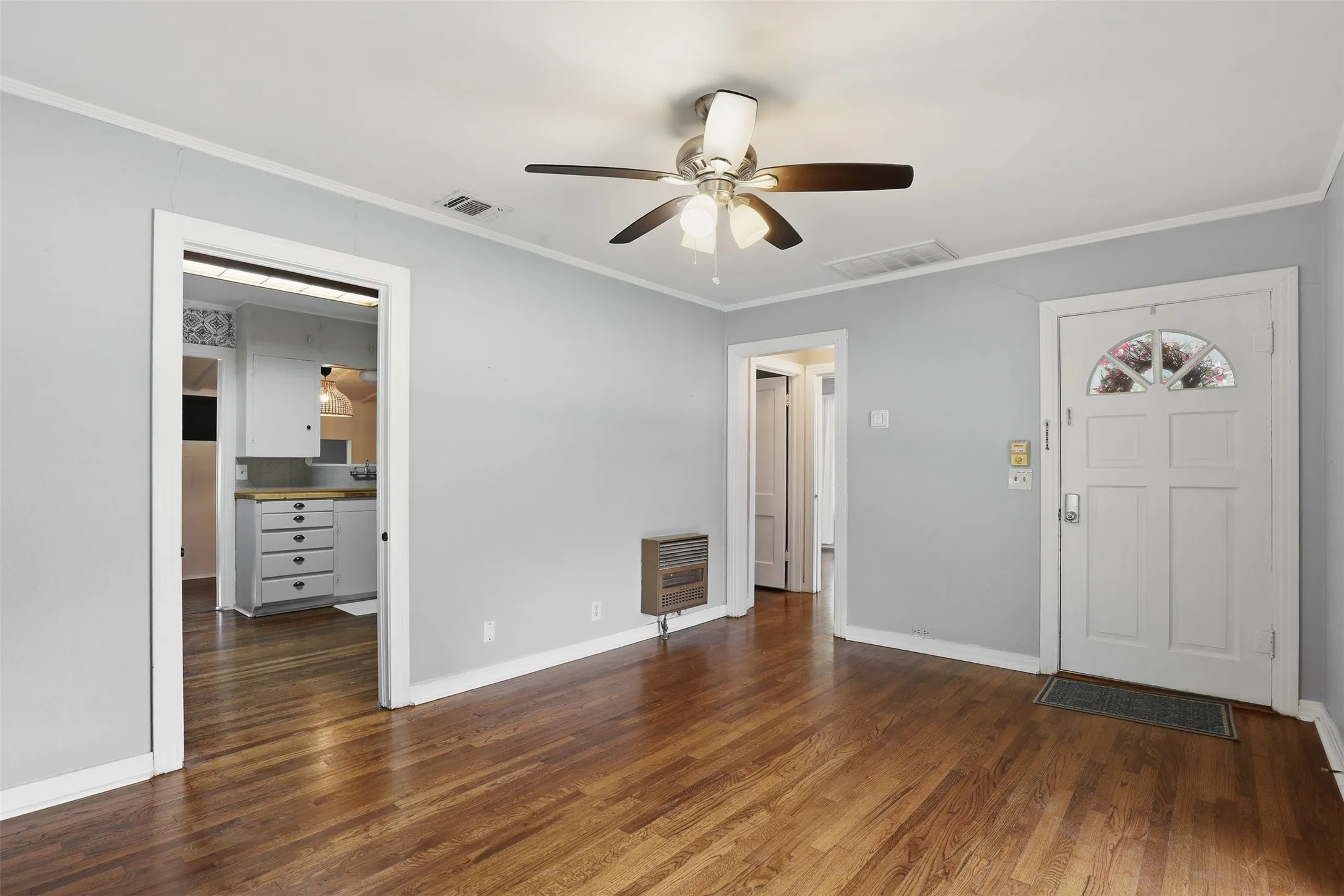 You'll love these hardwood floors and crown molding.