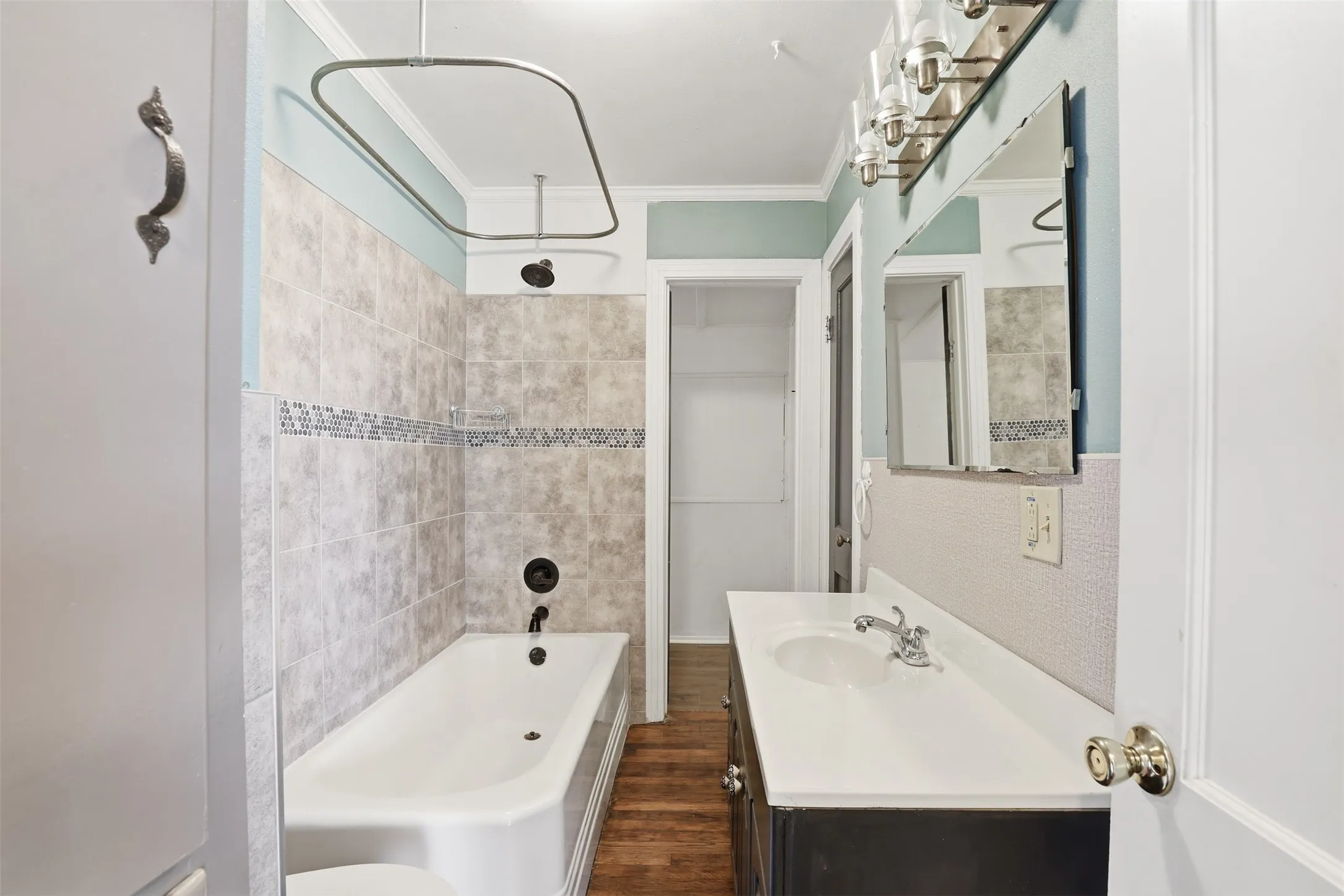 Bathroom is a Jack & Jill. You can enter from the hallway on two sides.