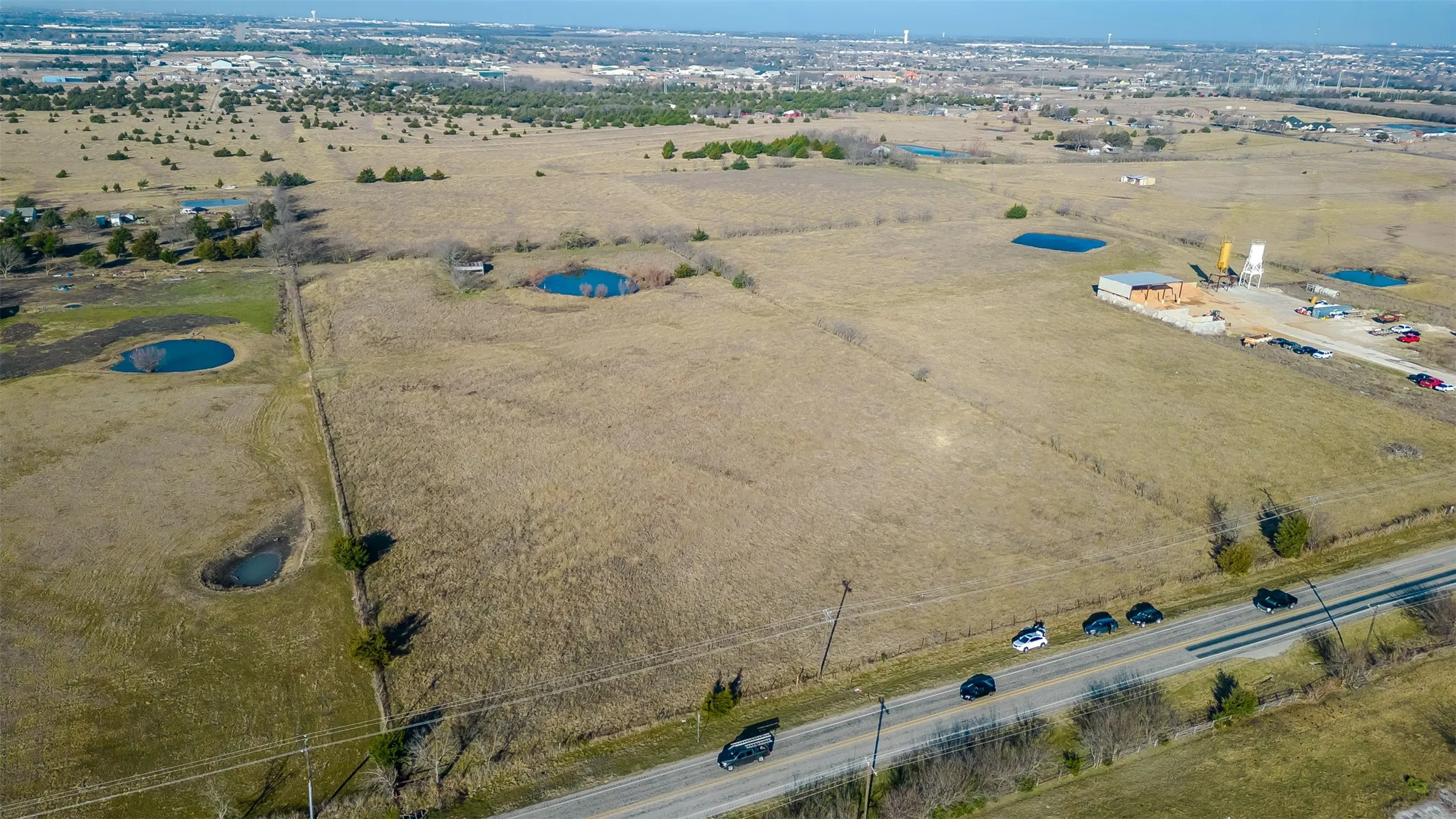 Expansive undeveloped land featuring direct road frontage