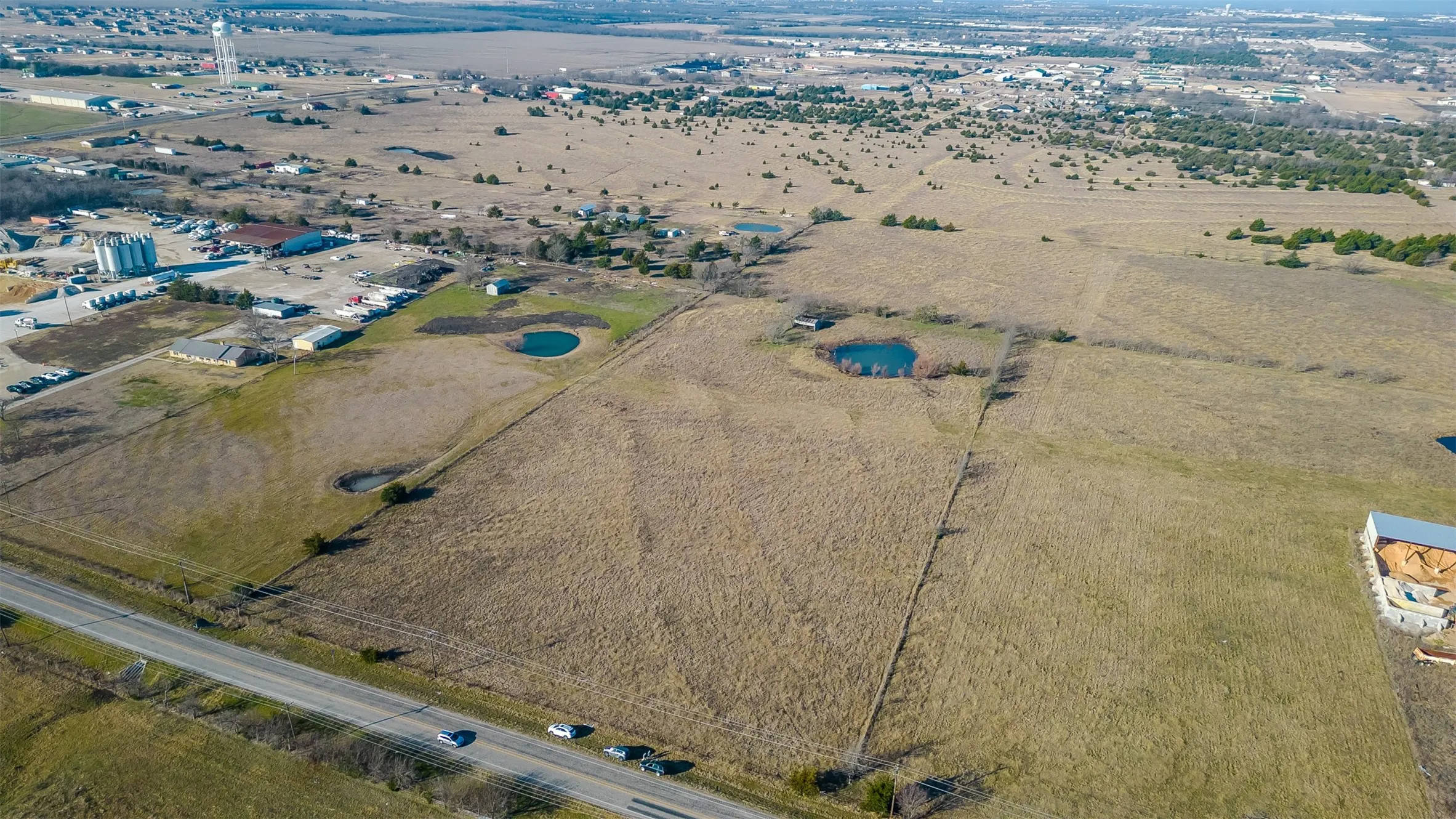 Expansive undeveloped land featuring direct road frontage