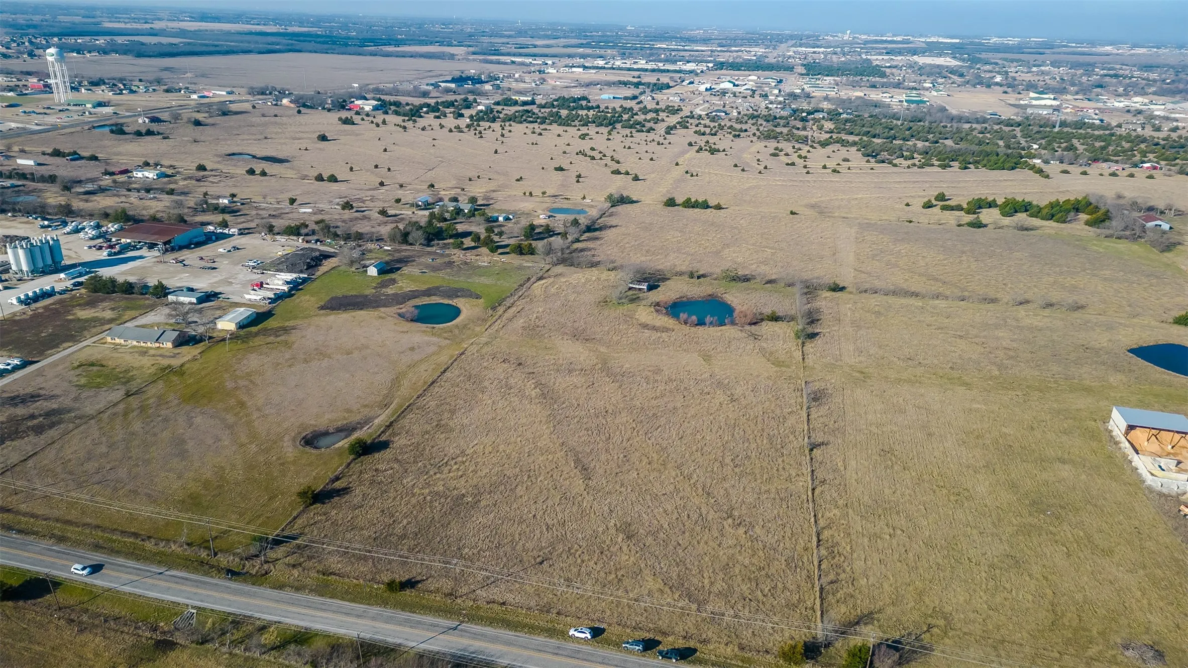 Expansive acreage featuring a highway frontage, and surrounding open land