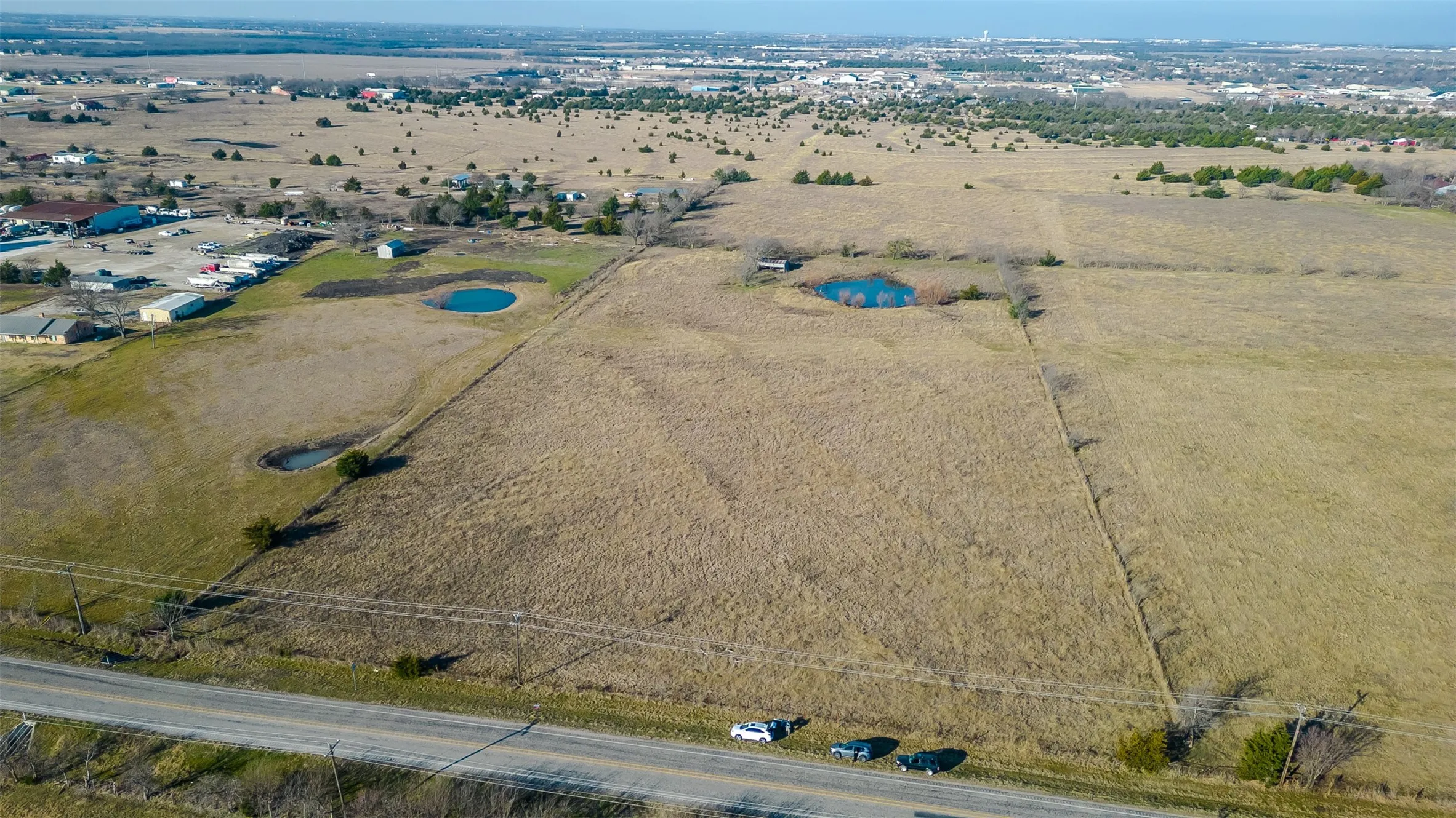 Expansive acreage featuring perimeter fencing, and abundant open land
