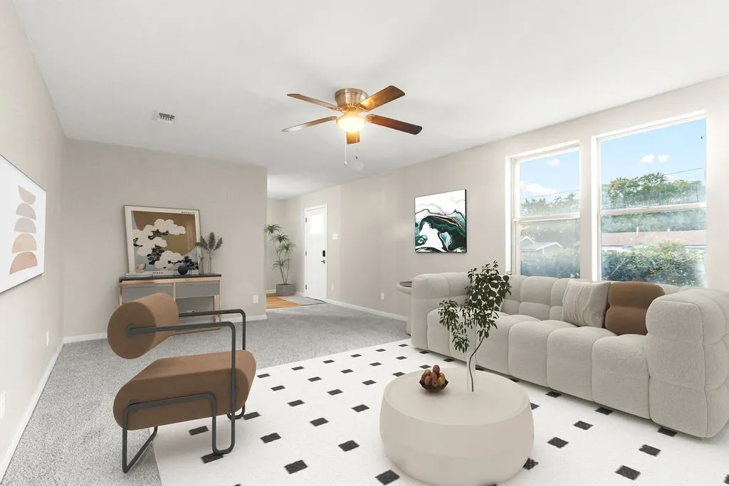 Recessed lighting, ceiling fan, and carpet flooring