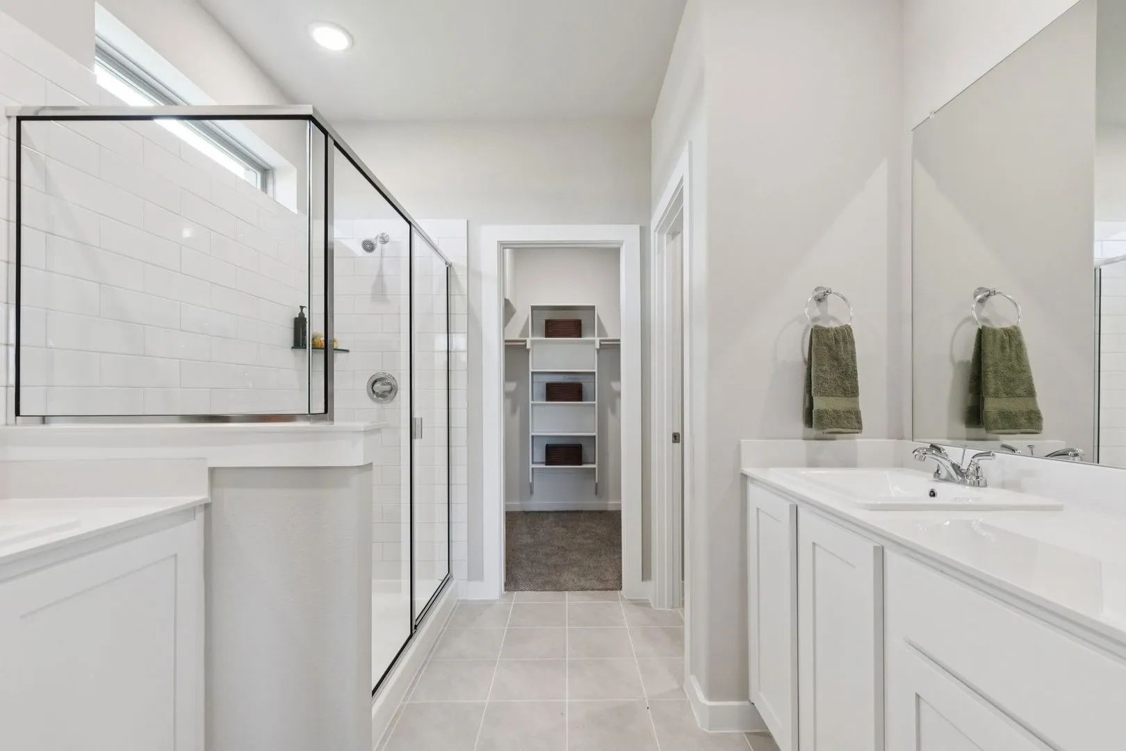 Primary Bathroom in the Magnolia home plan by Trophy Signature Homes – REPRESENTATIVE PHOTO