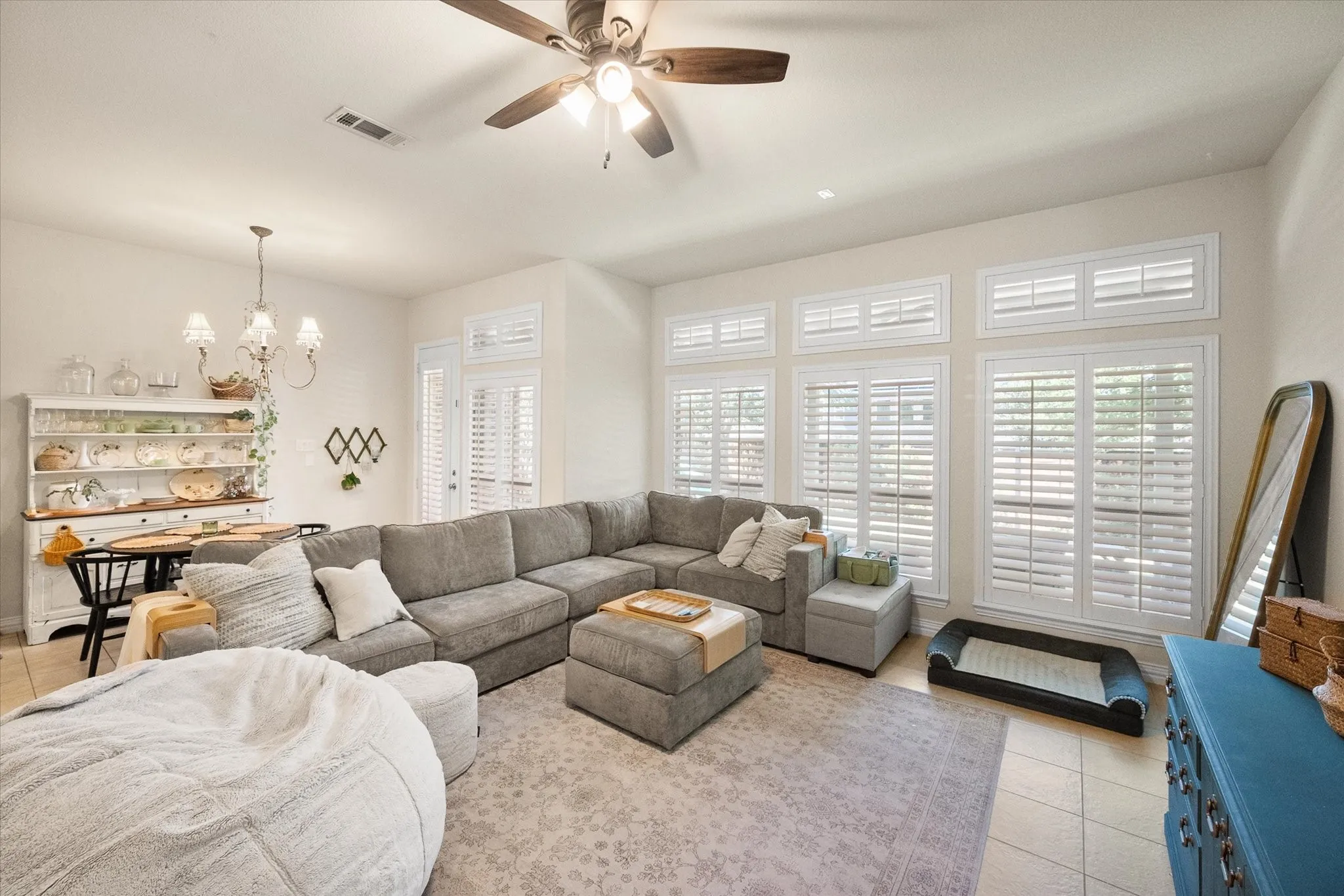 living room facing back windows and back door