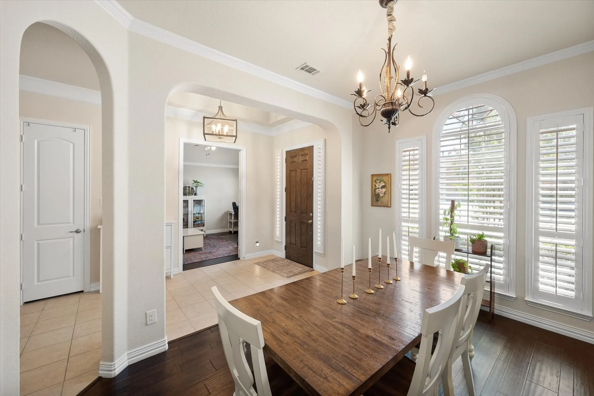 Dining area facing front door, office and hallway
