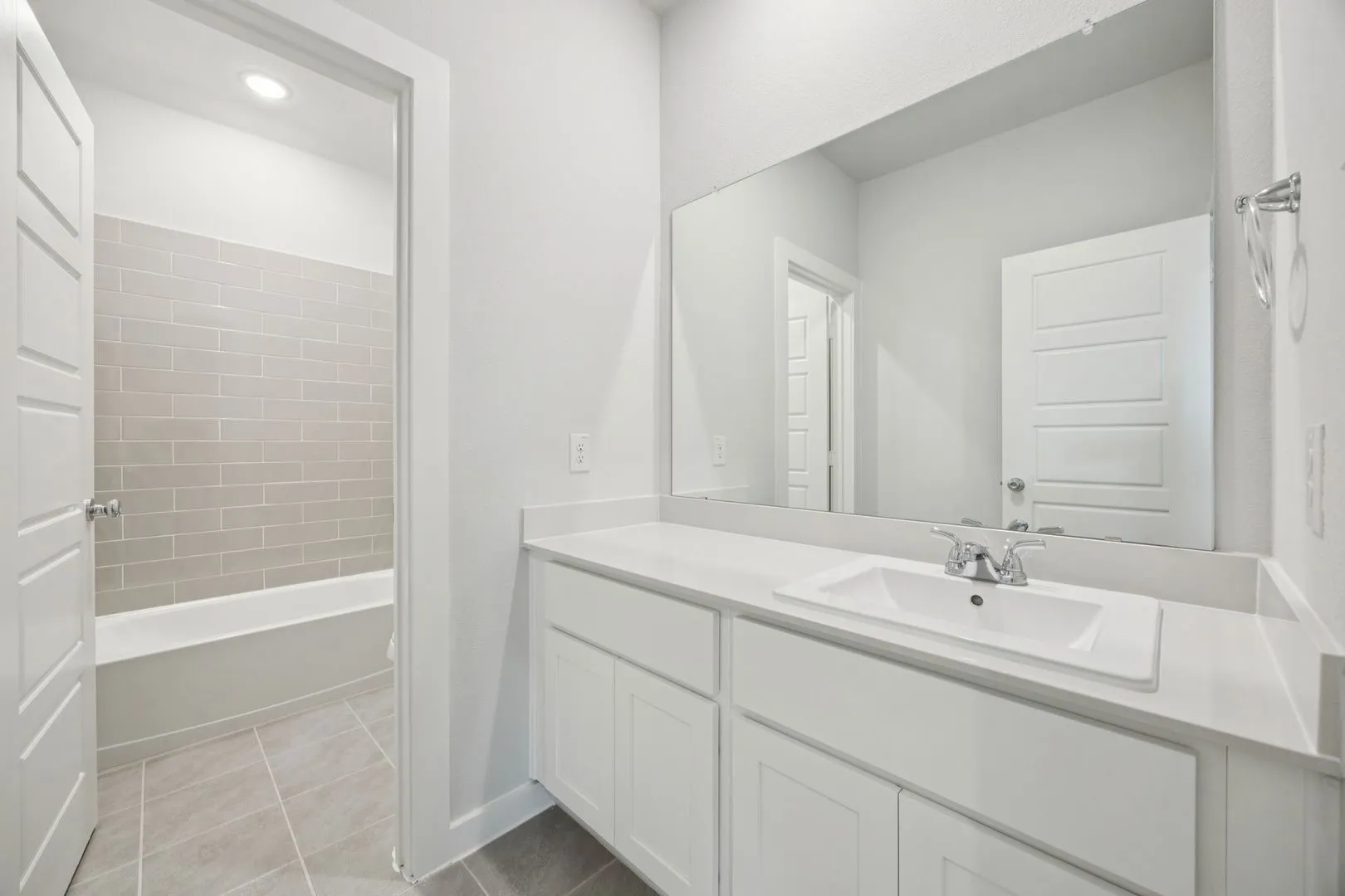 Bathroom in the Masters home plan by Trophy Signature Homes – REPRESENTATIVE PHOTO
