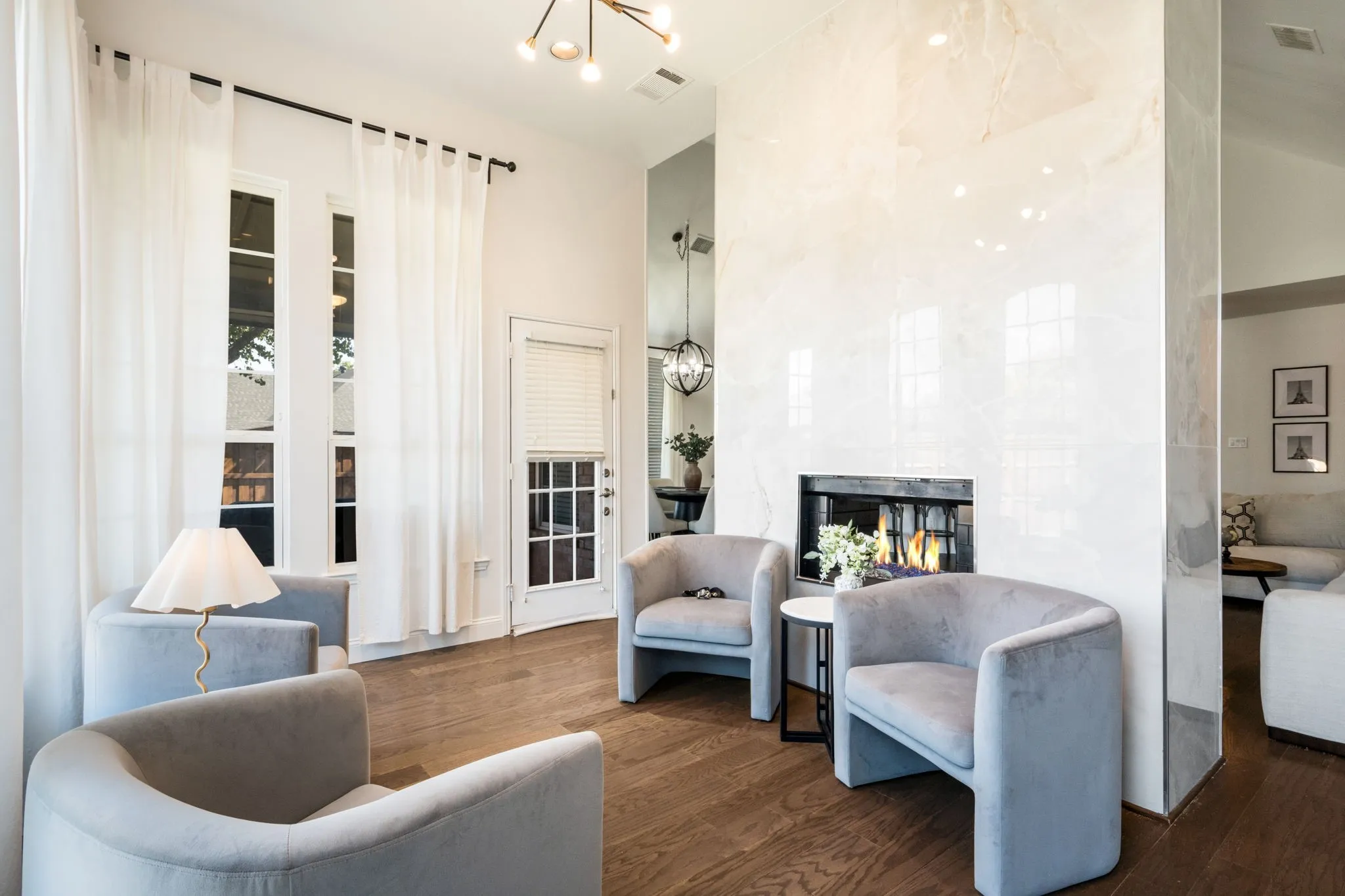 Secondary living room with double sided fireplace