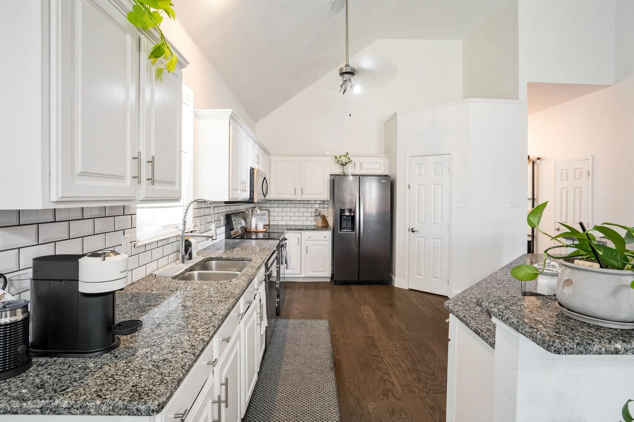 Open kitchen with plenty of cabinets