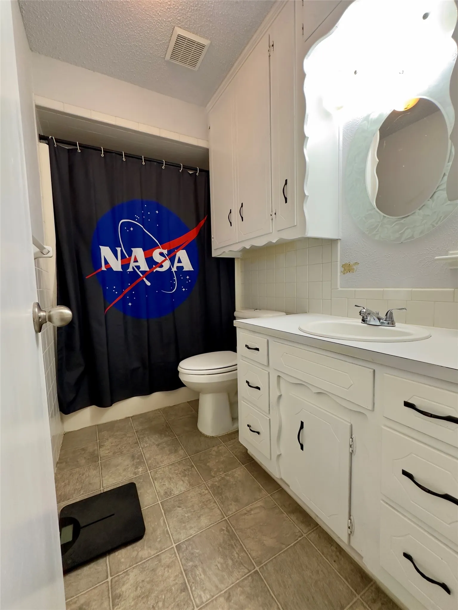 White vanity with integrated sink