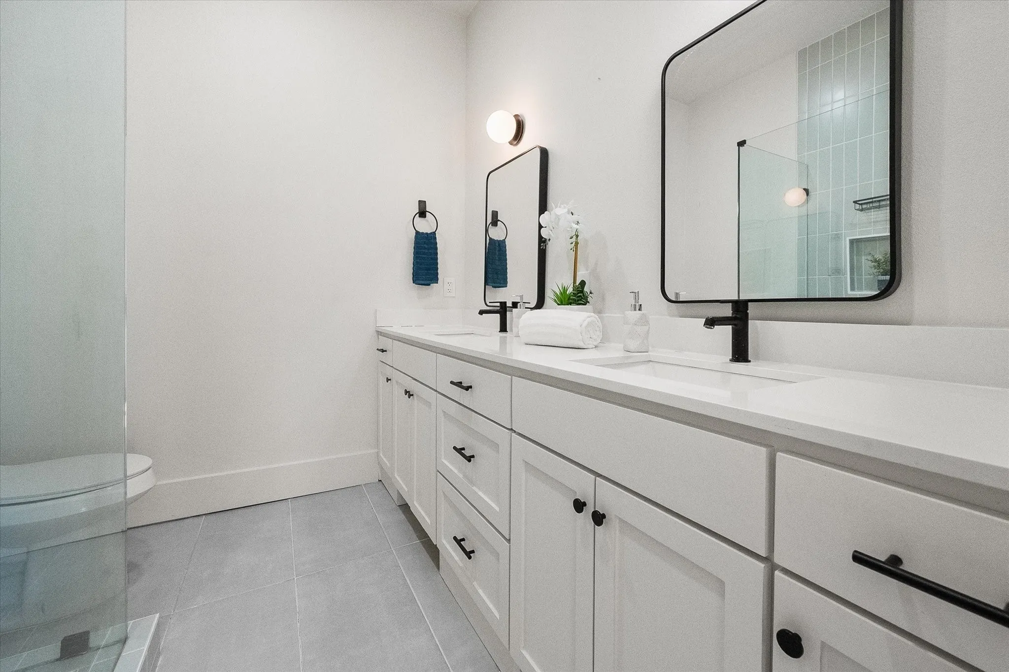 Primary bathroom features dual sinks.