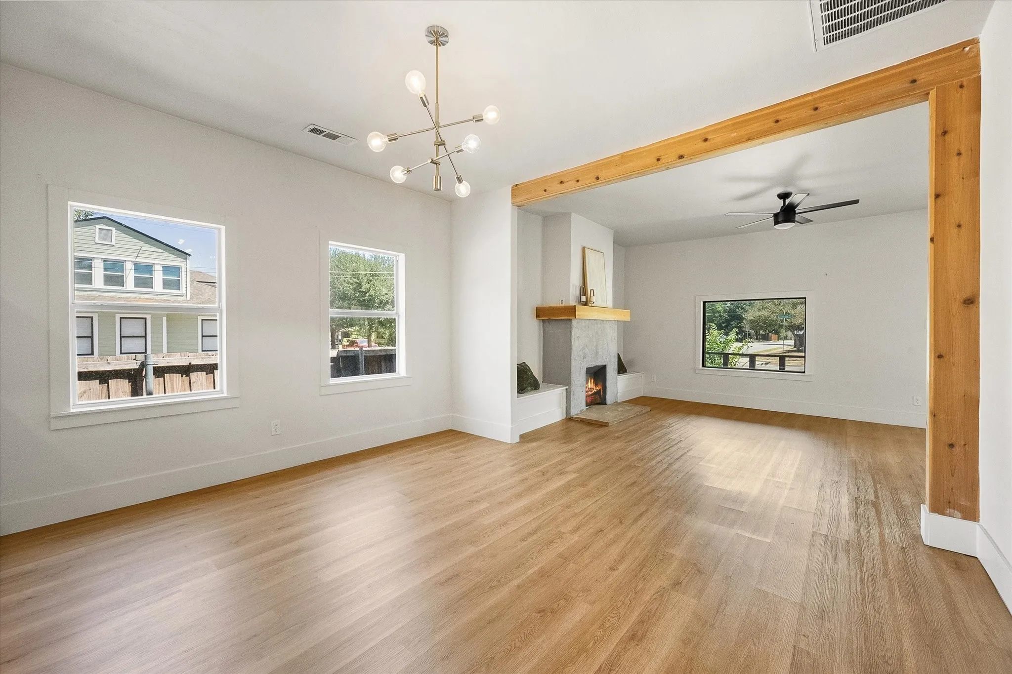 Dining area features decorative lighting.