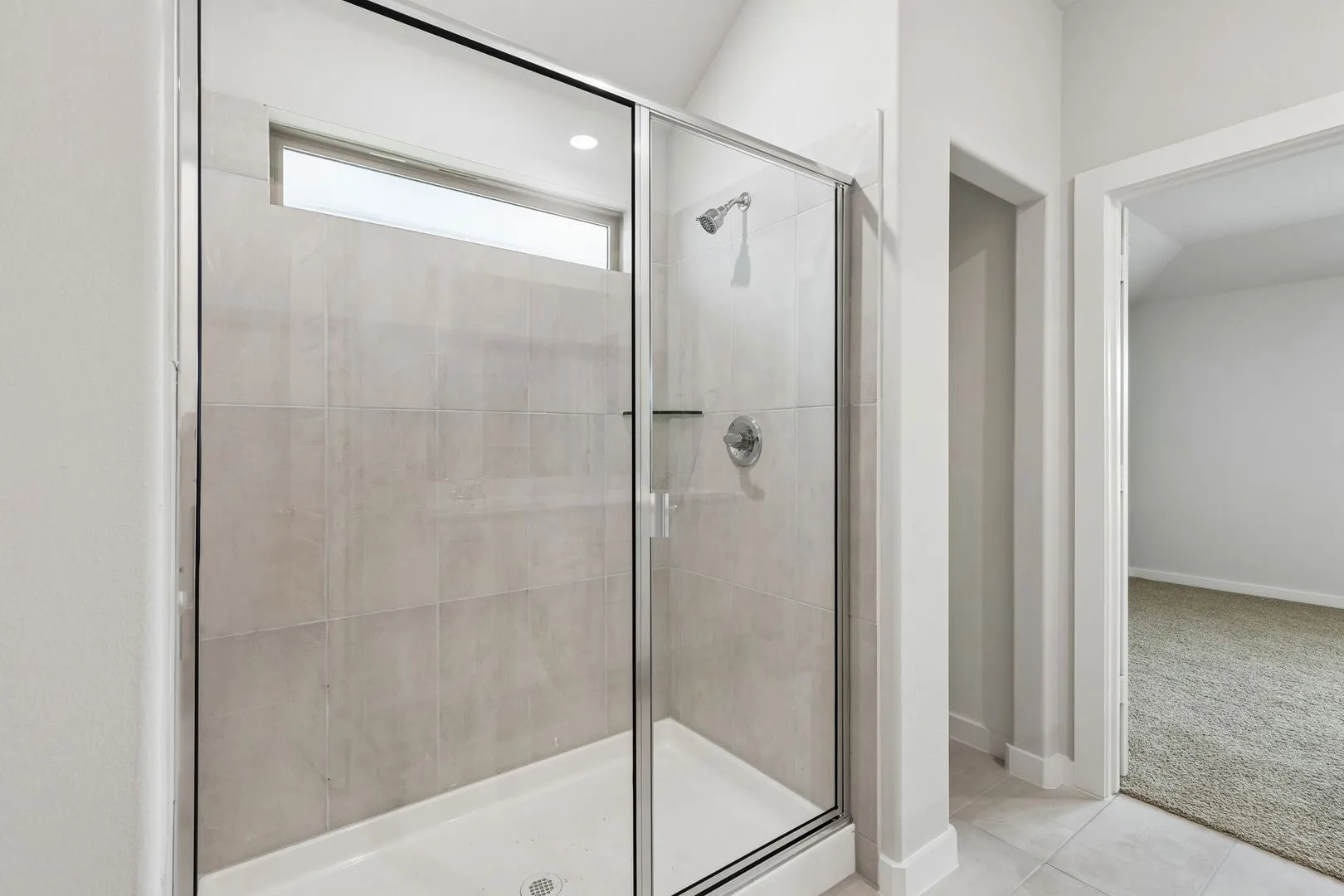 Primary Bathroom in the Oscar home plan by Trophy Signature Homes – REPRESENTATIVE PHOTO