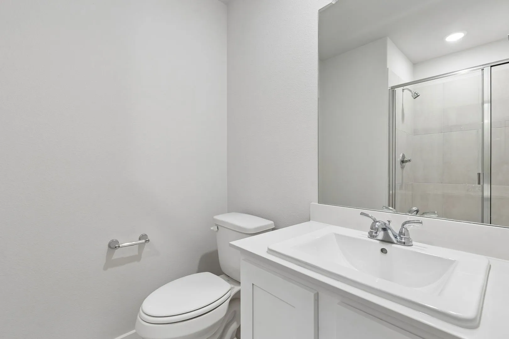 Bathroom in the Oscar home plan by Trophy Signature Homes – REPRESENTATIVE PHOTO