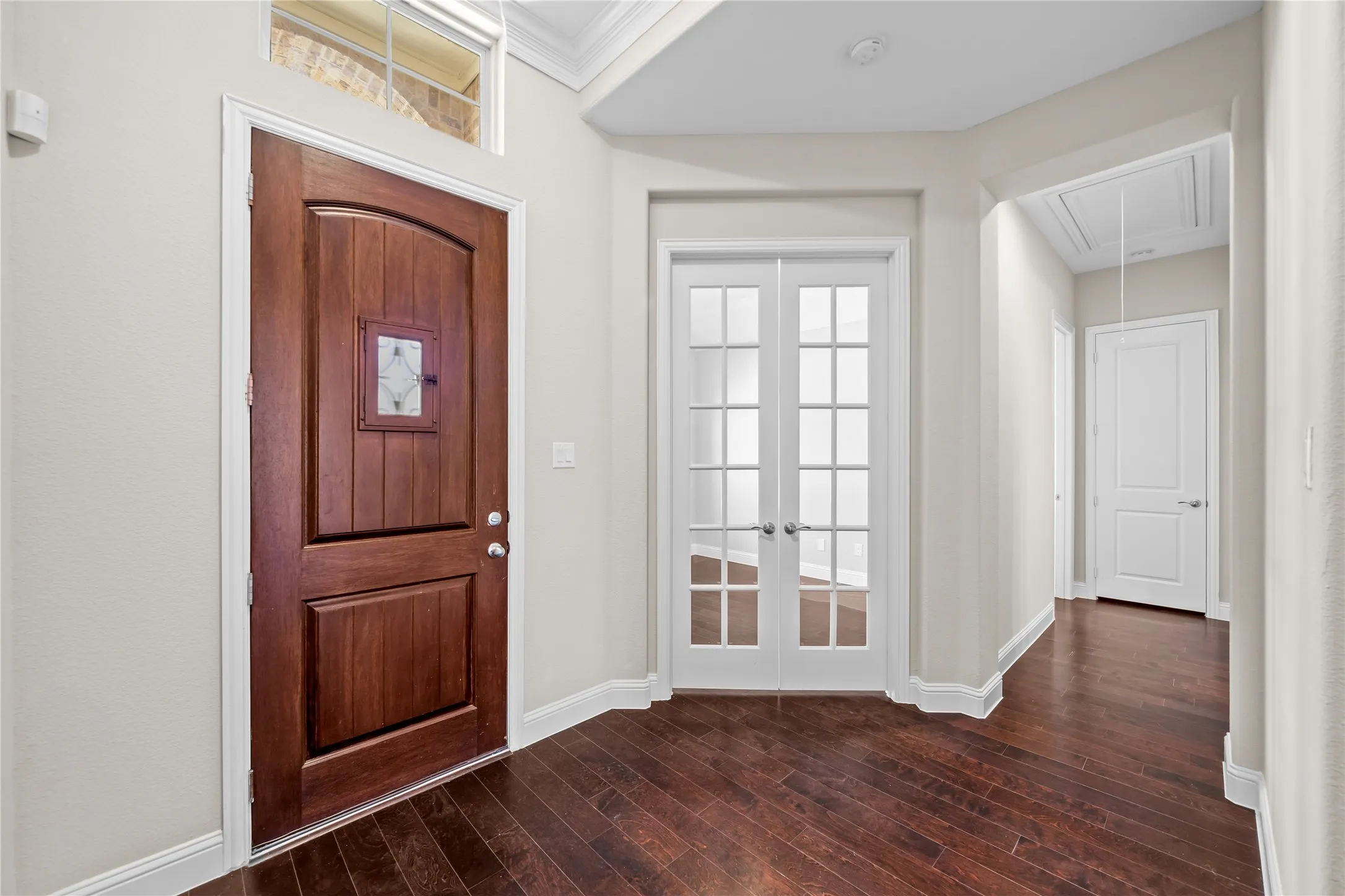 Rich wood-finish flooring throughout