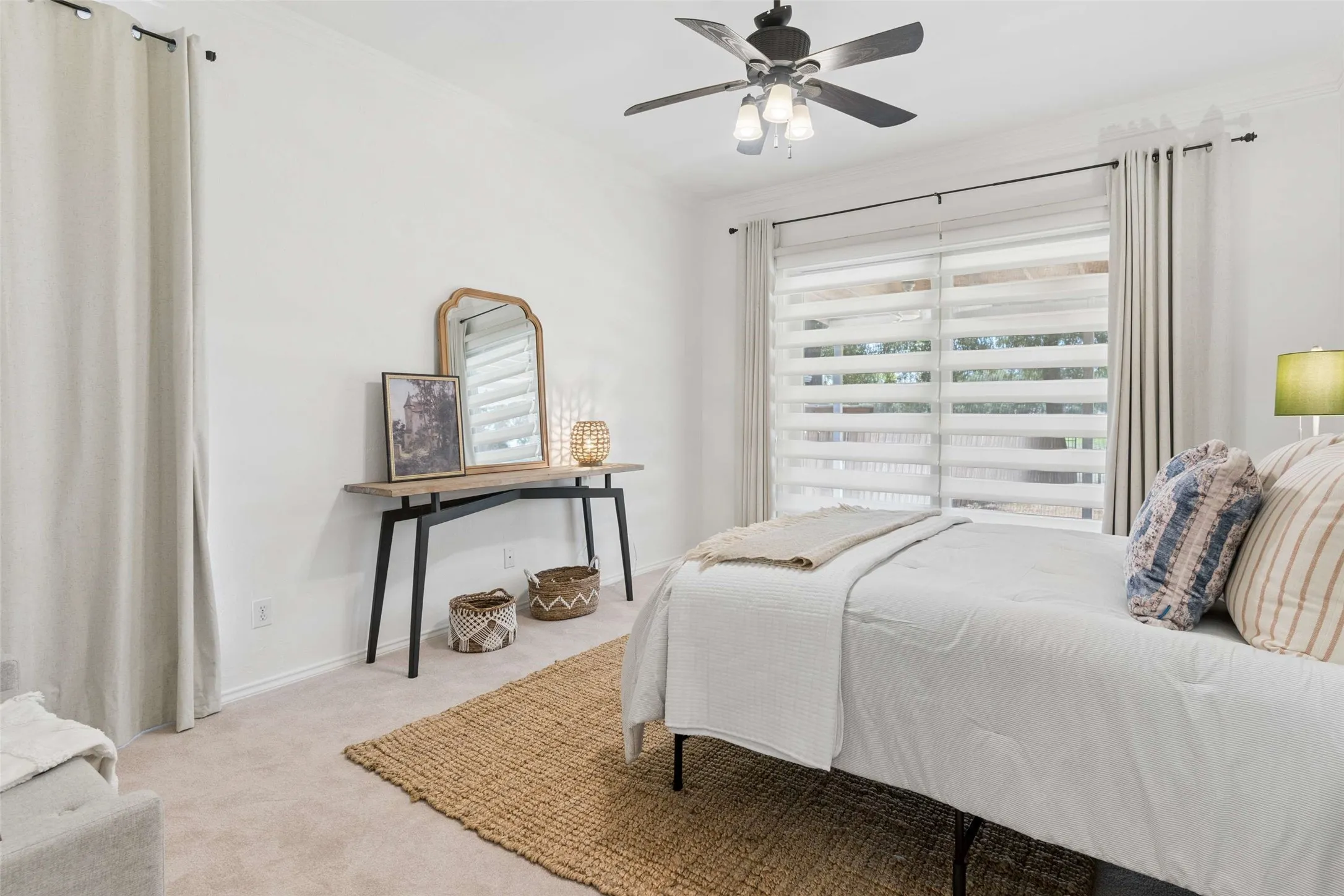 Recessed lighting, ceiling fan with light kit, and natural light from a window with horizontal blinds