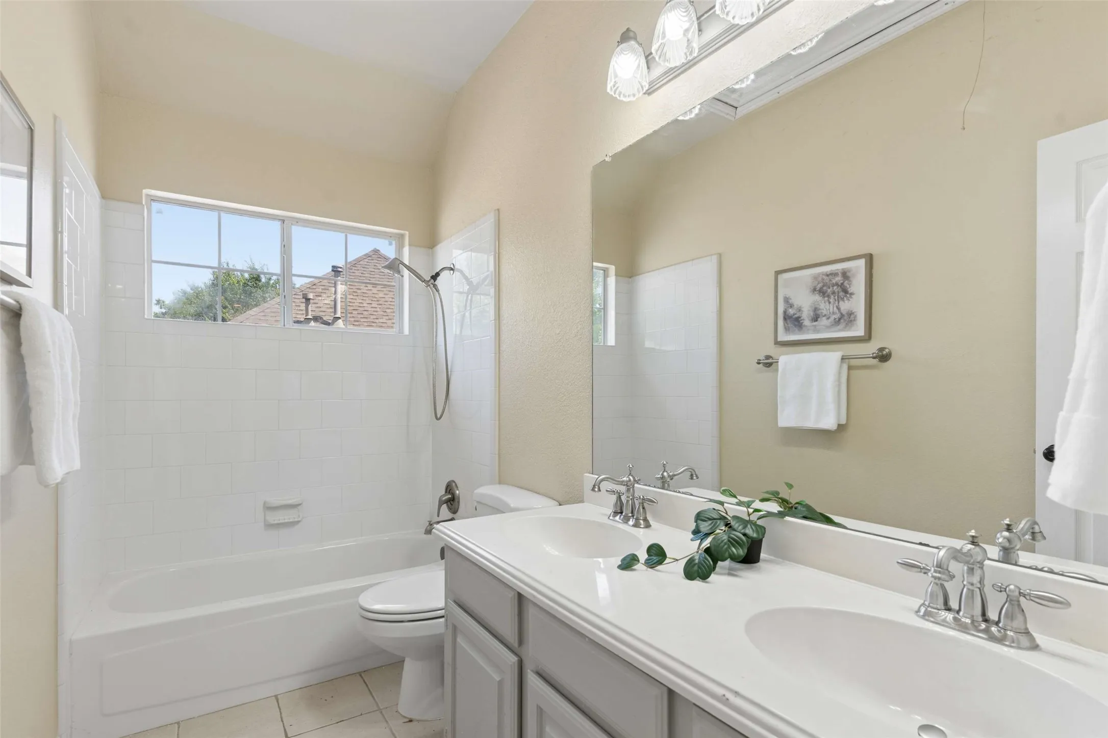 Dual vanity with undermount sinks and chrome fixtures