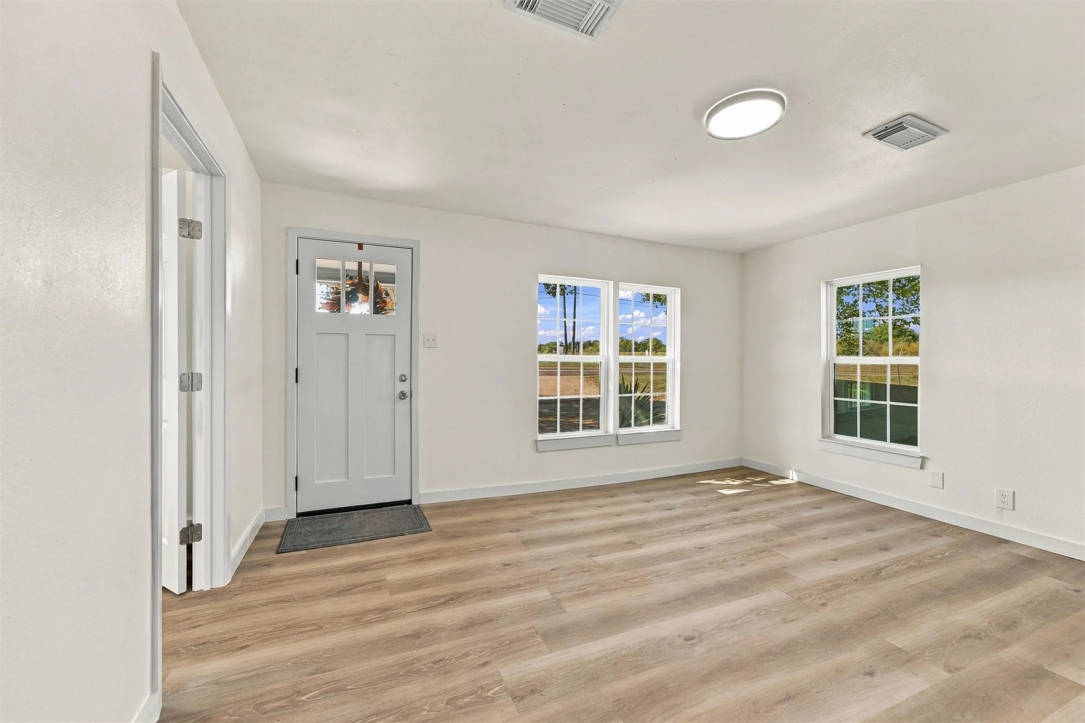 Renovated interior with new sheetrock and a fresh, updated feel.