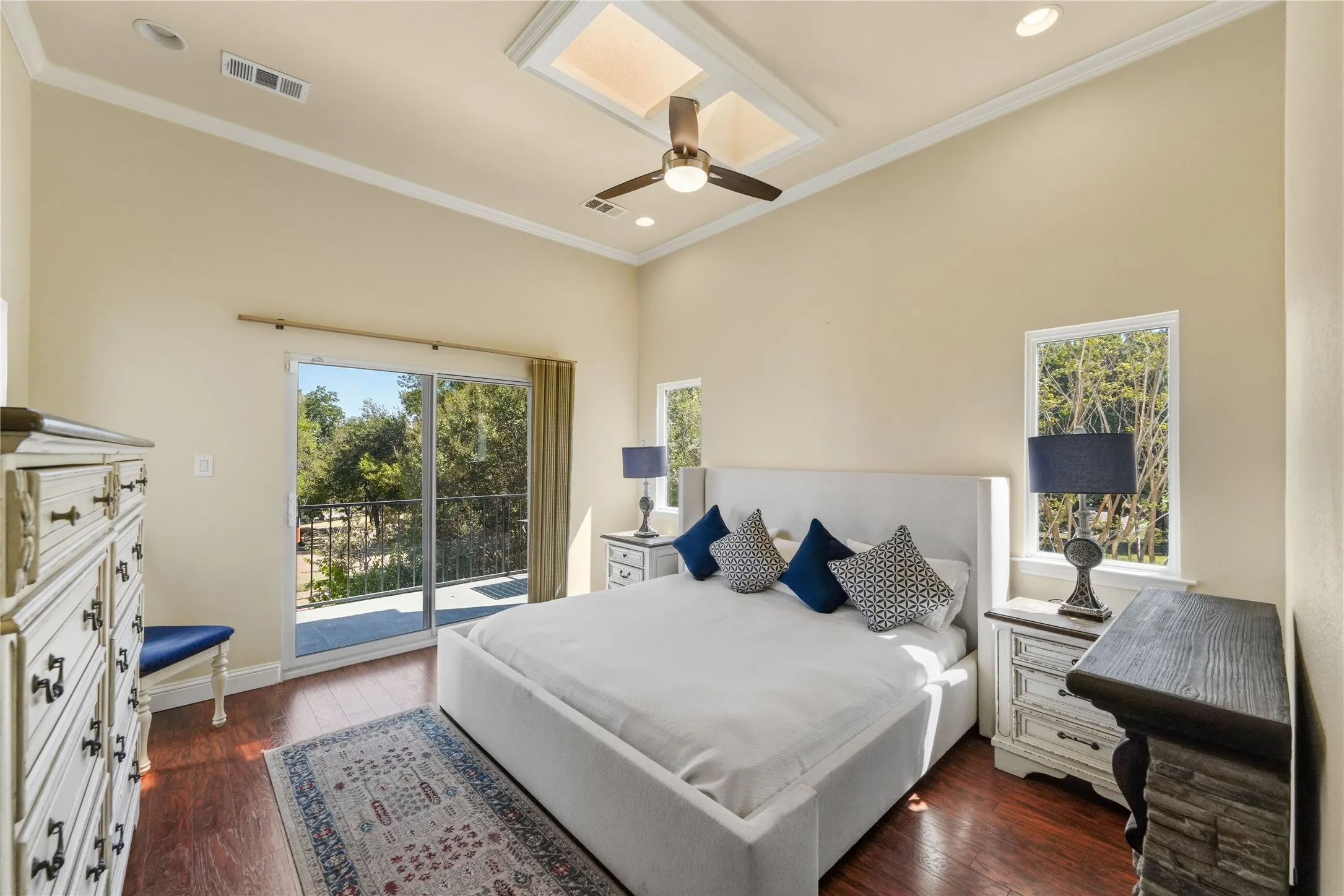 Large master with a lakeview and balcony.