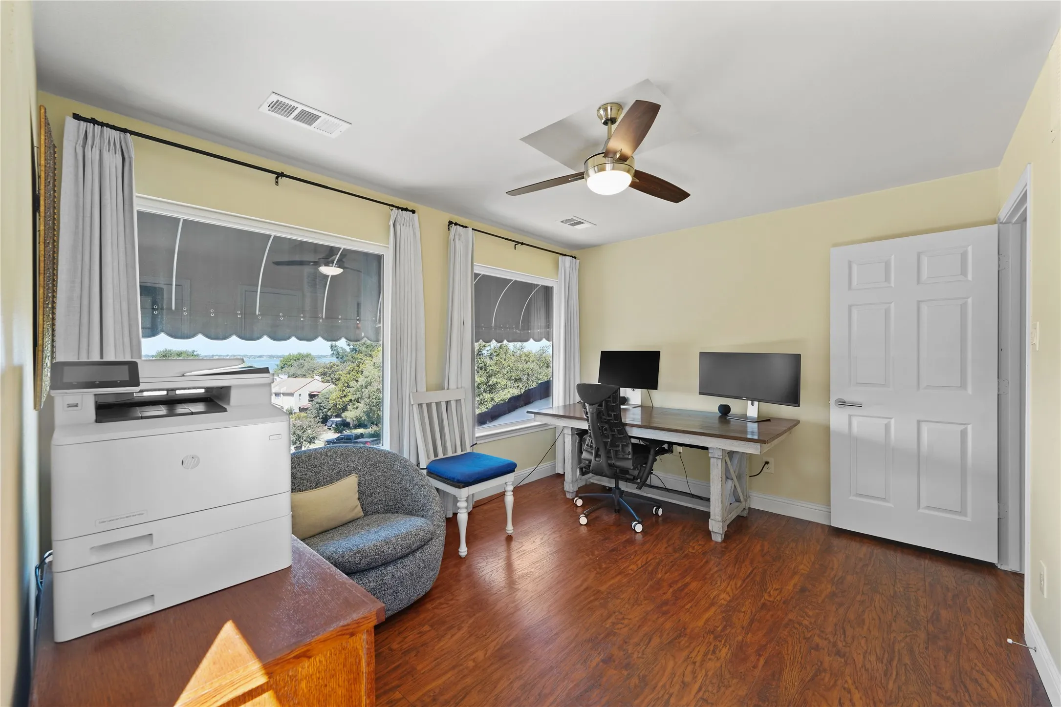3rd bedroom with a lake view and balcony