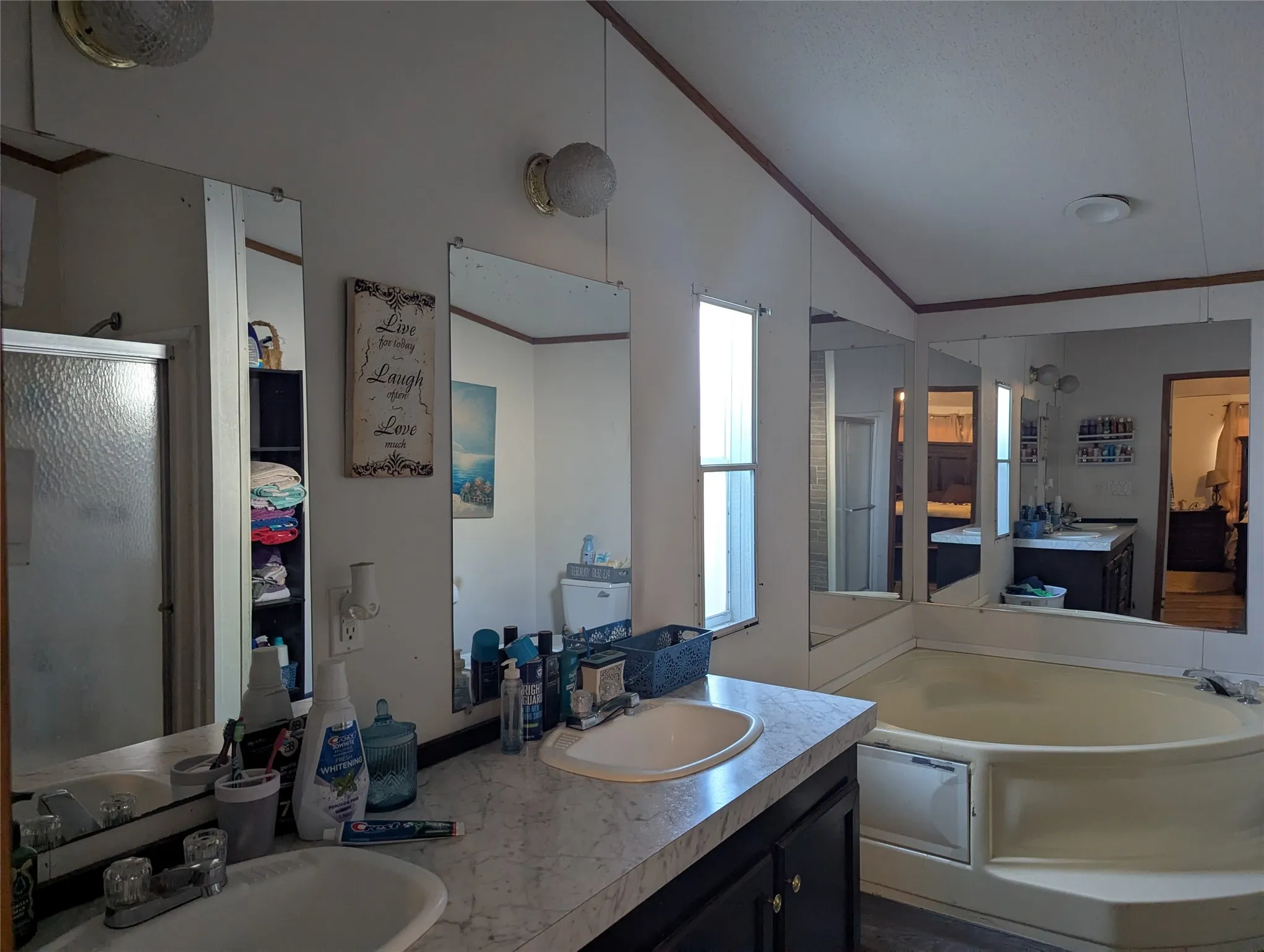 Ensuite Primary bathroom and dual sinks and a garden tub.