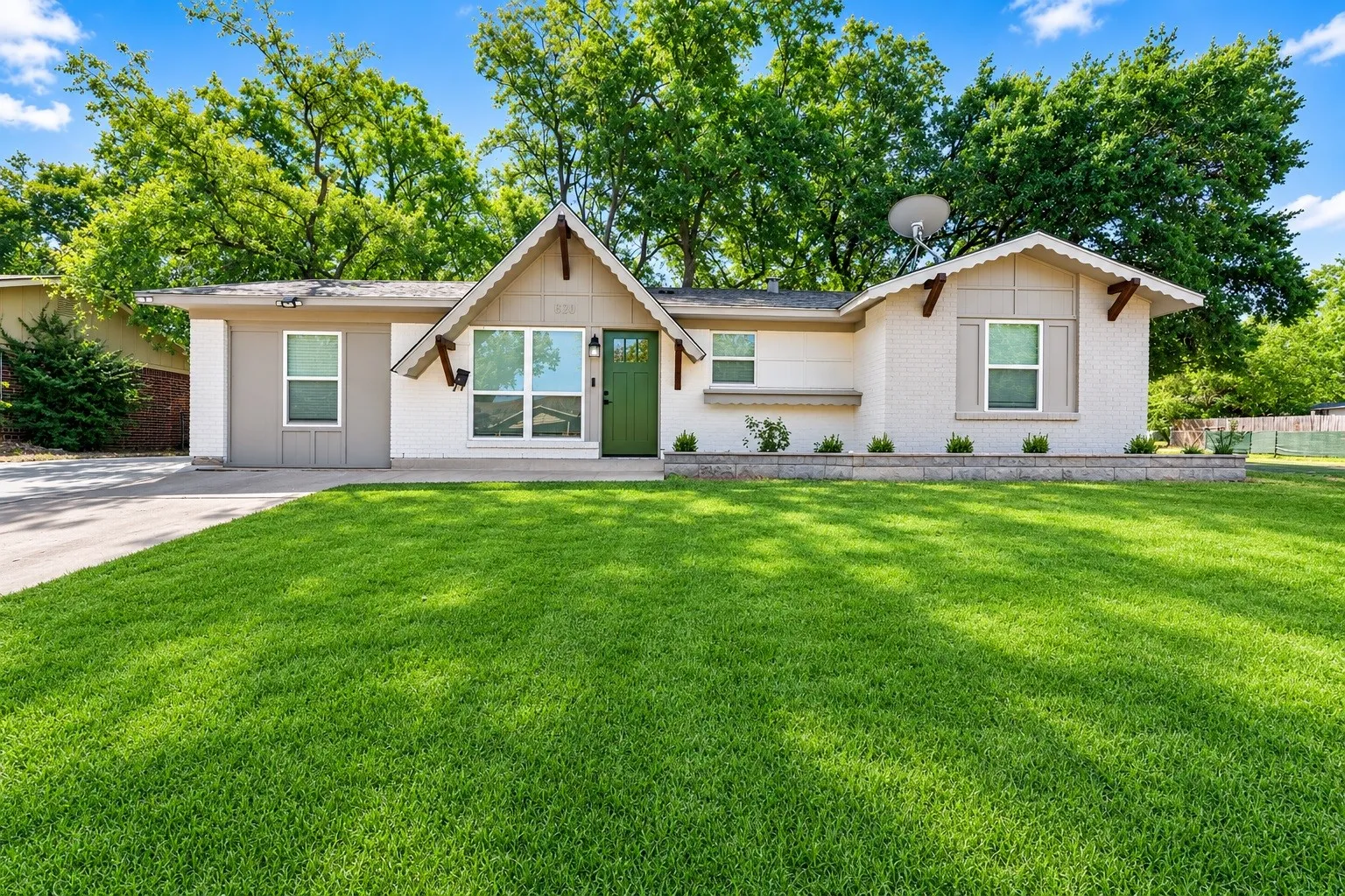 Welcome home! The driveway has been extended to allow for additional parking.