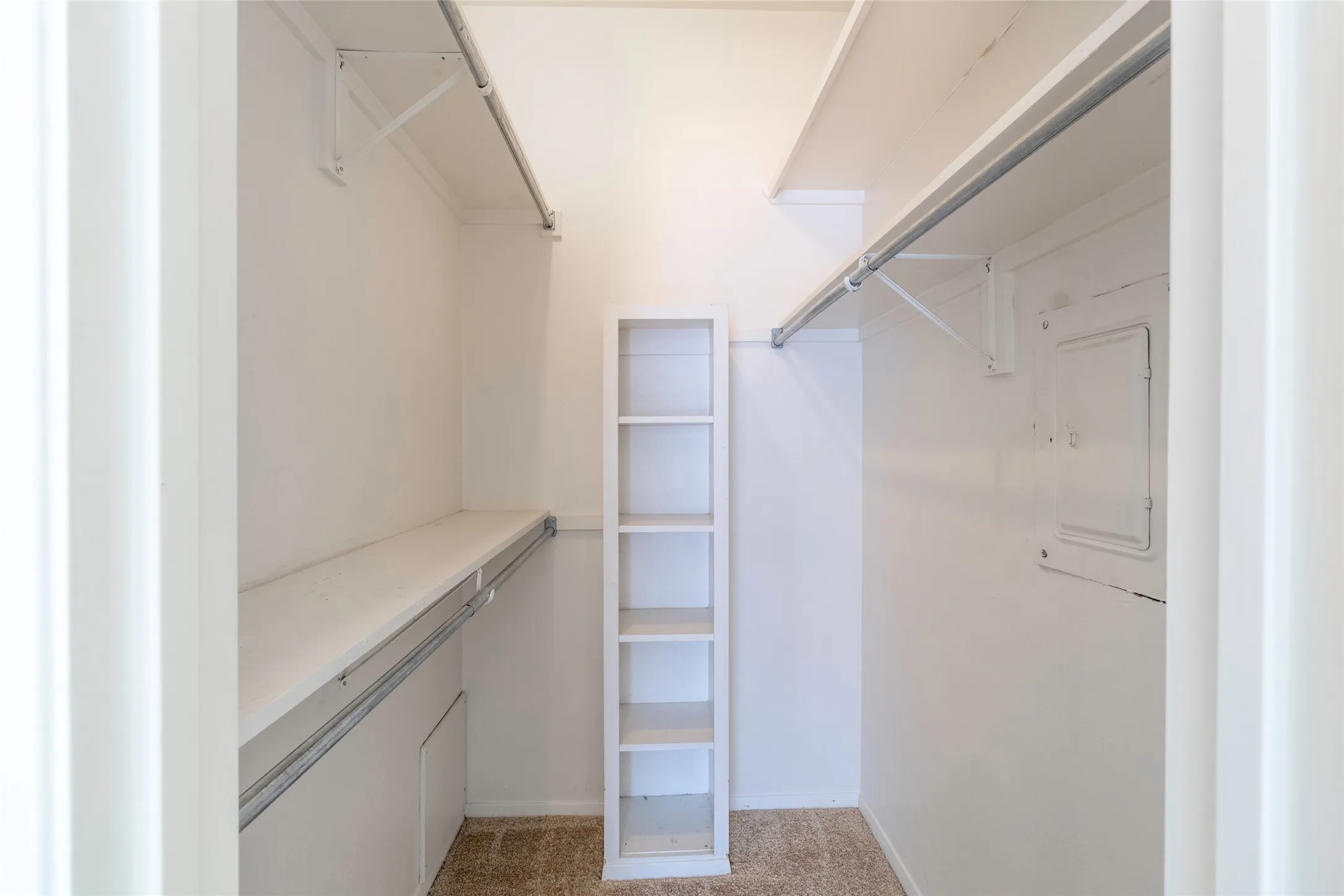 Walk in closet featuring electric panel