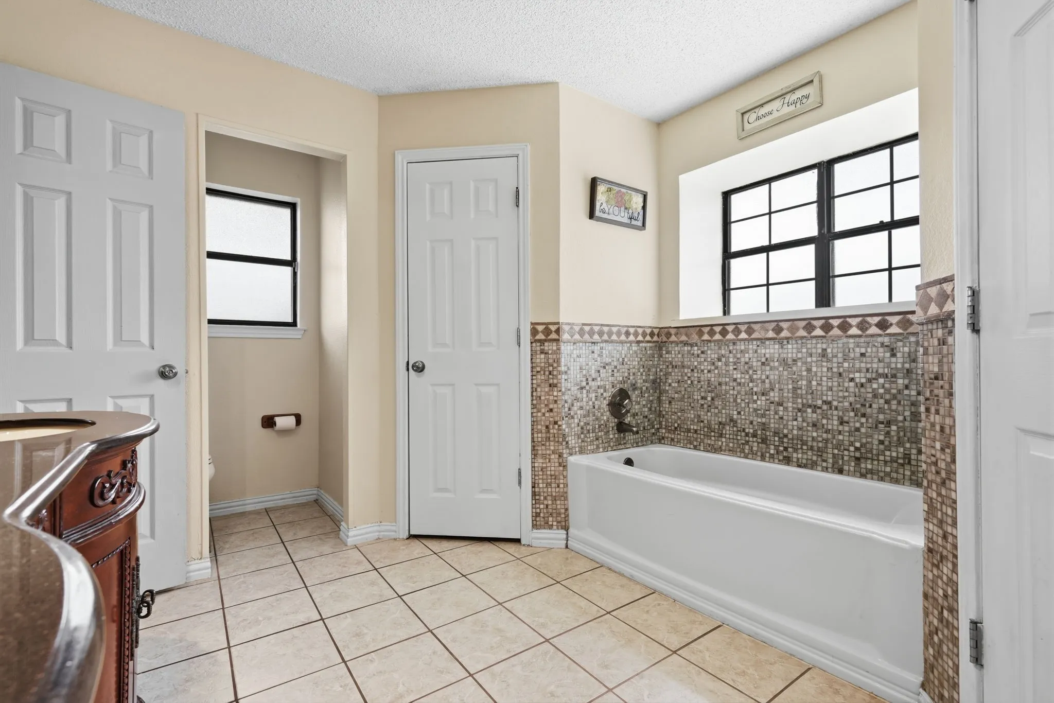 Ensuite bathroom has walk-in Shower, garden Tub and TWO Closets