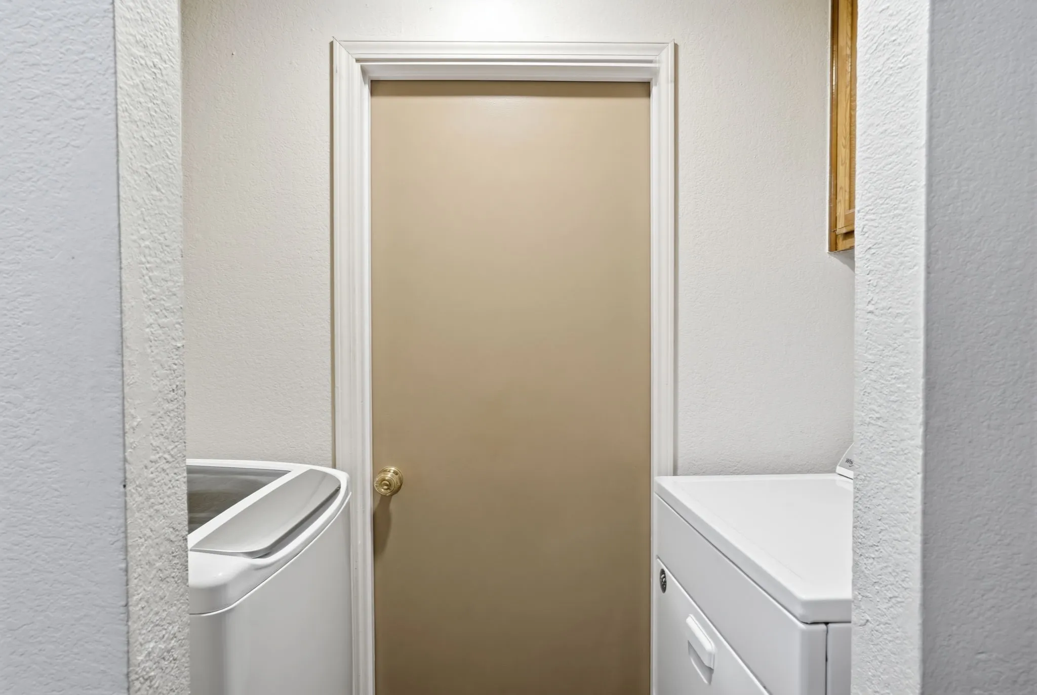 Laundry area is INSIDE the house.